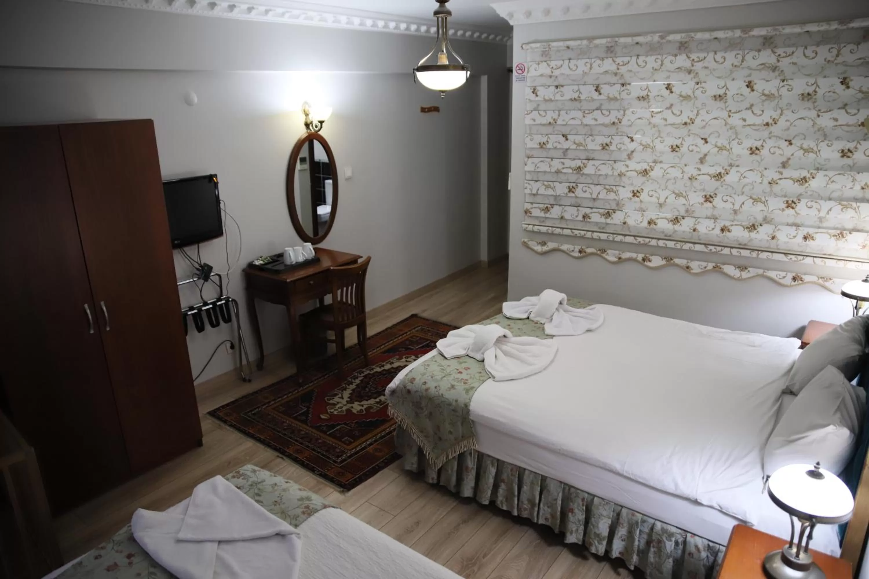 Bed in Basileus Hotel