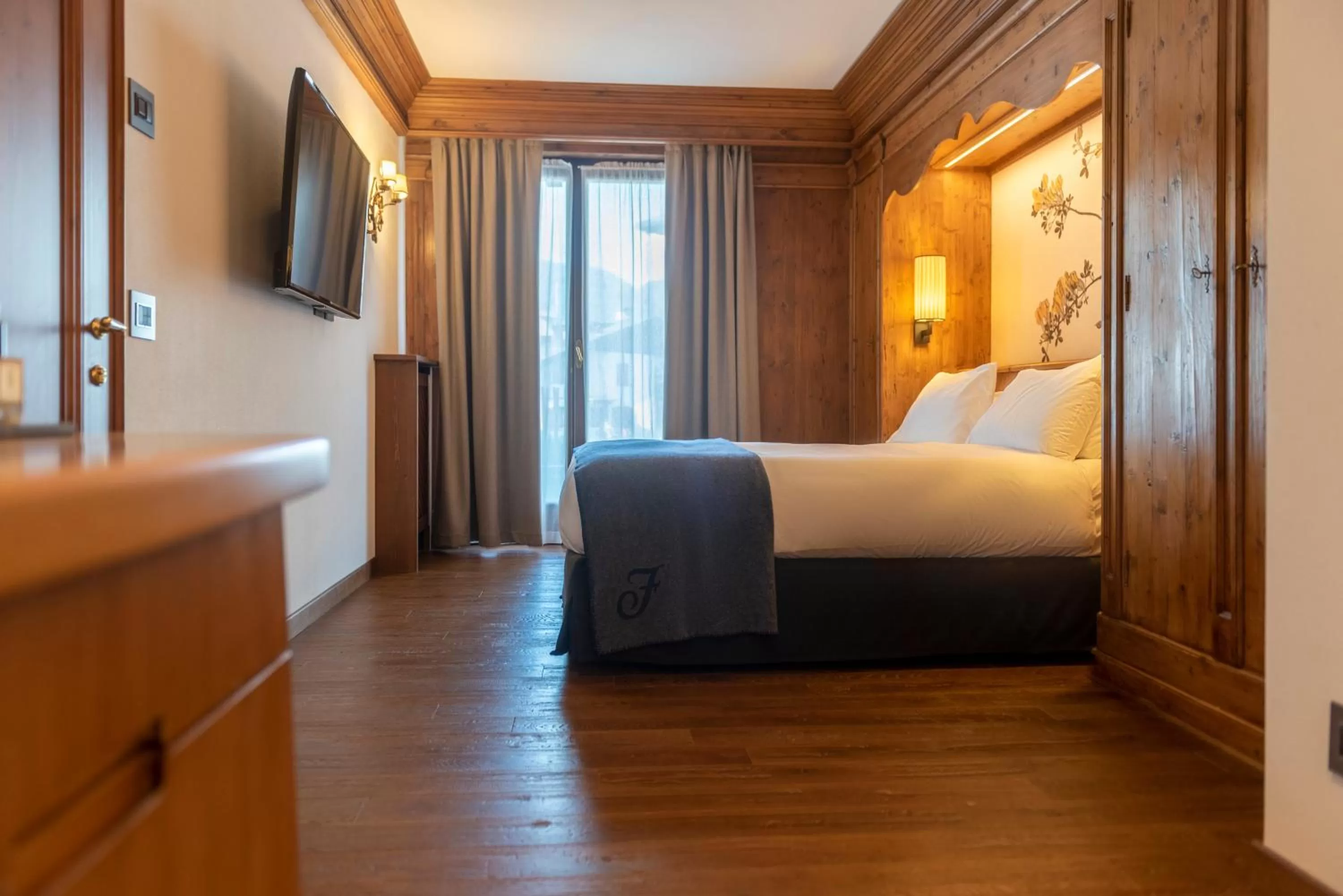 Bed in Faloria Mountain Spa Resort