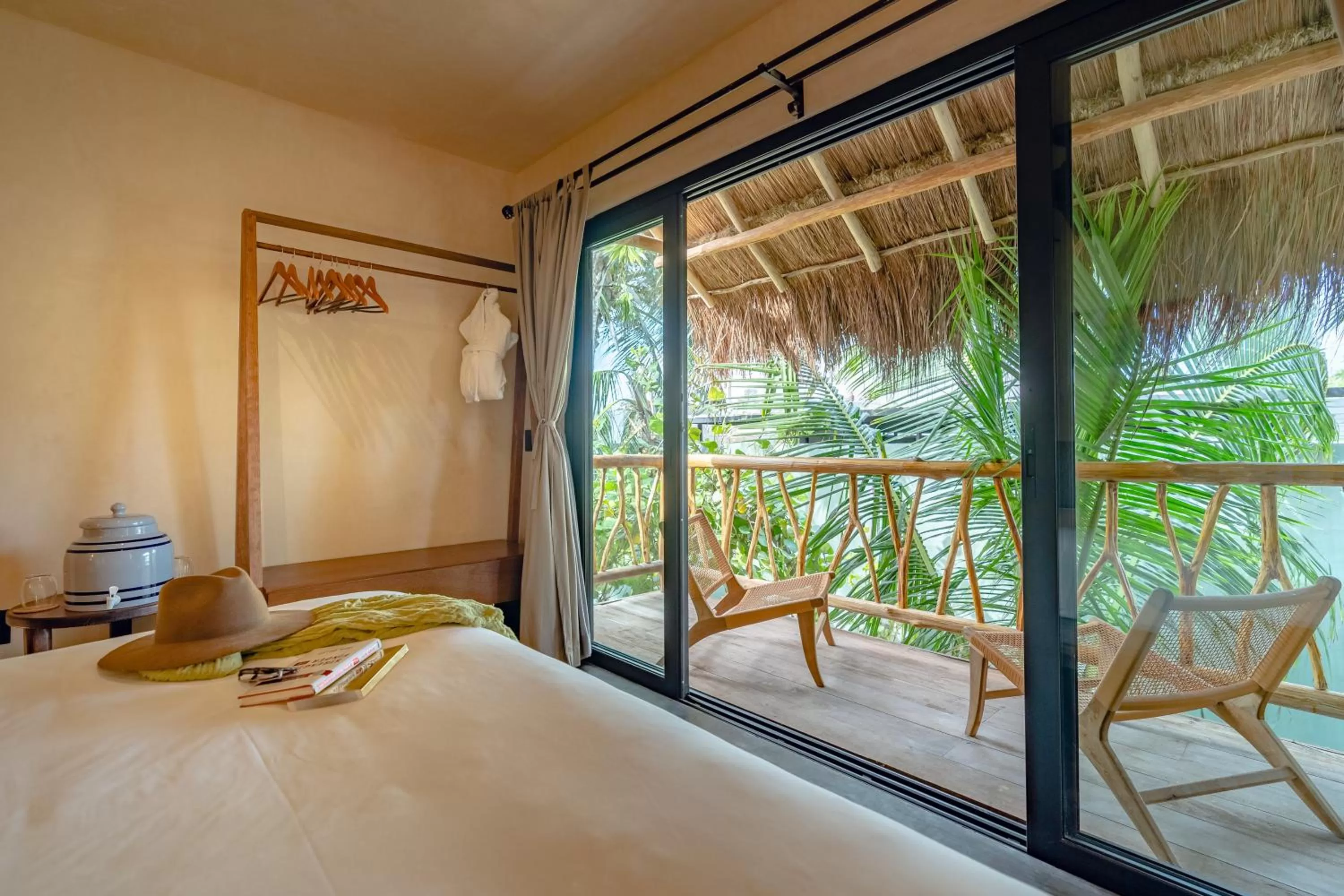 Balcony/Terrace, Bed in Casa Ganesh Tulum-Beachfront hotel by Ahau Collection