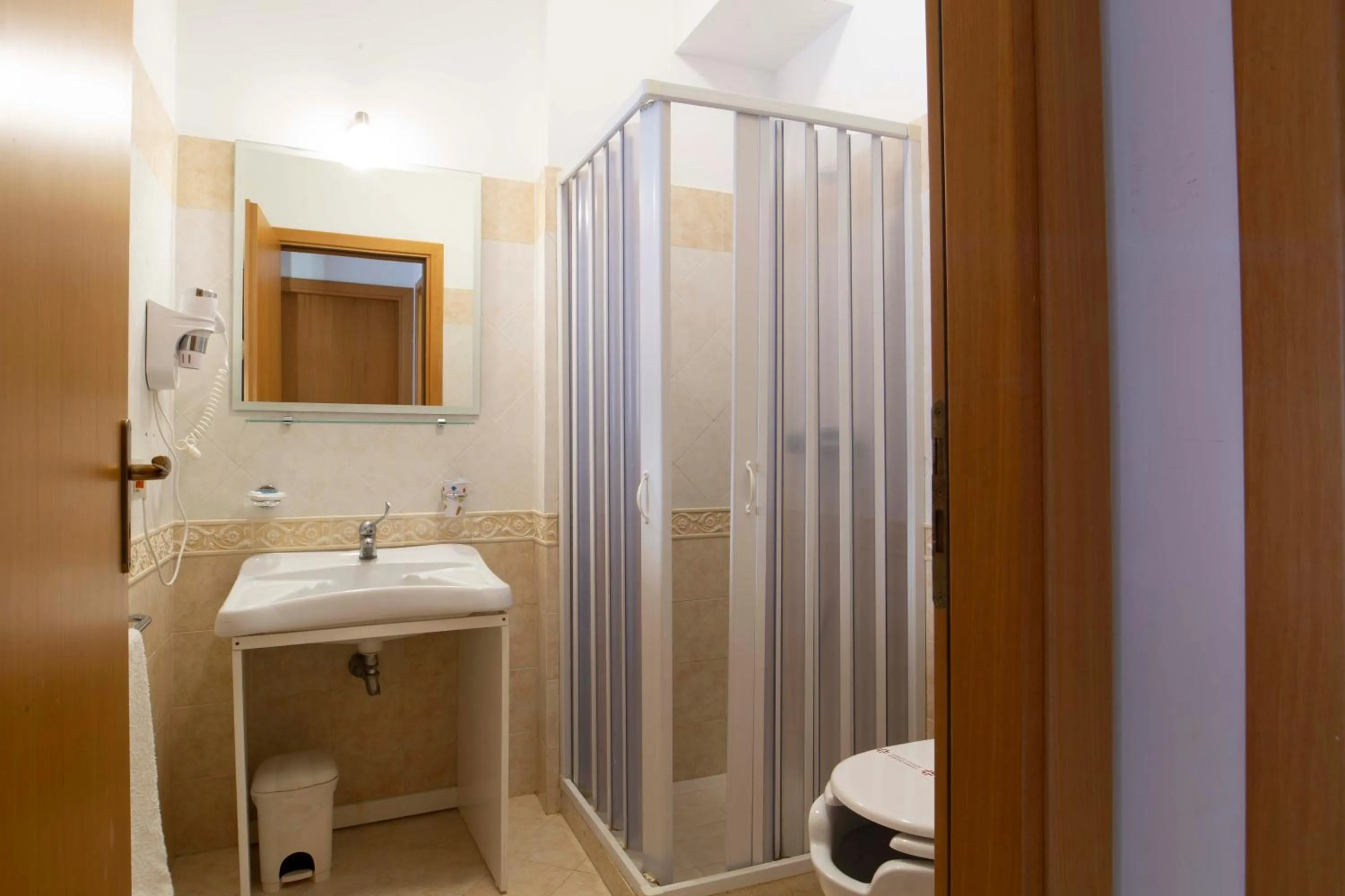 Toilet in Hotel Iride by Marino Tourist