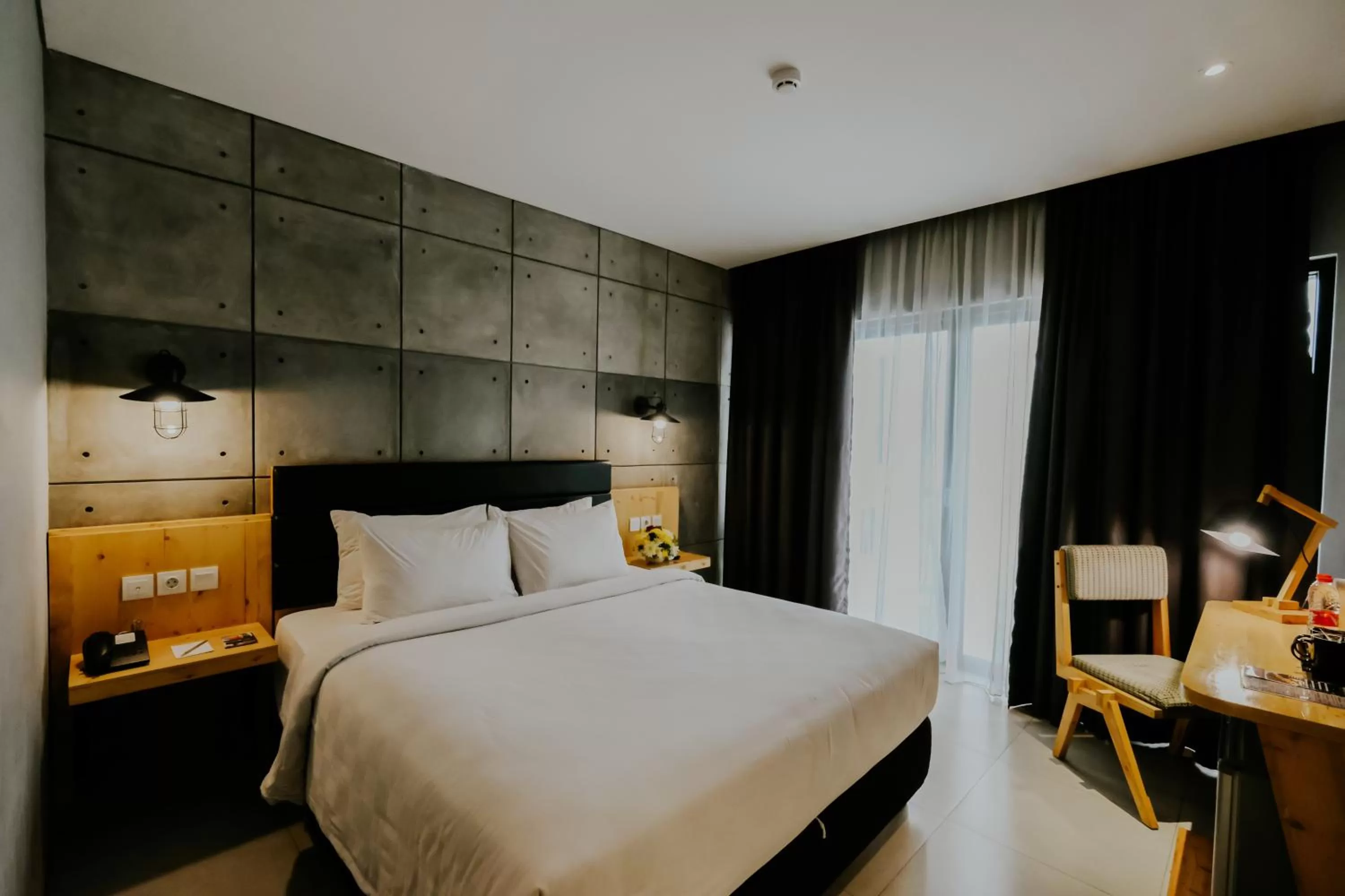 Balcony/Terrace, Bed in Ayaartta Hotel Malioboro