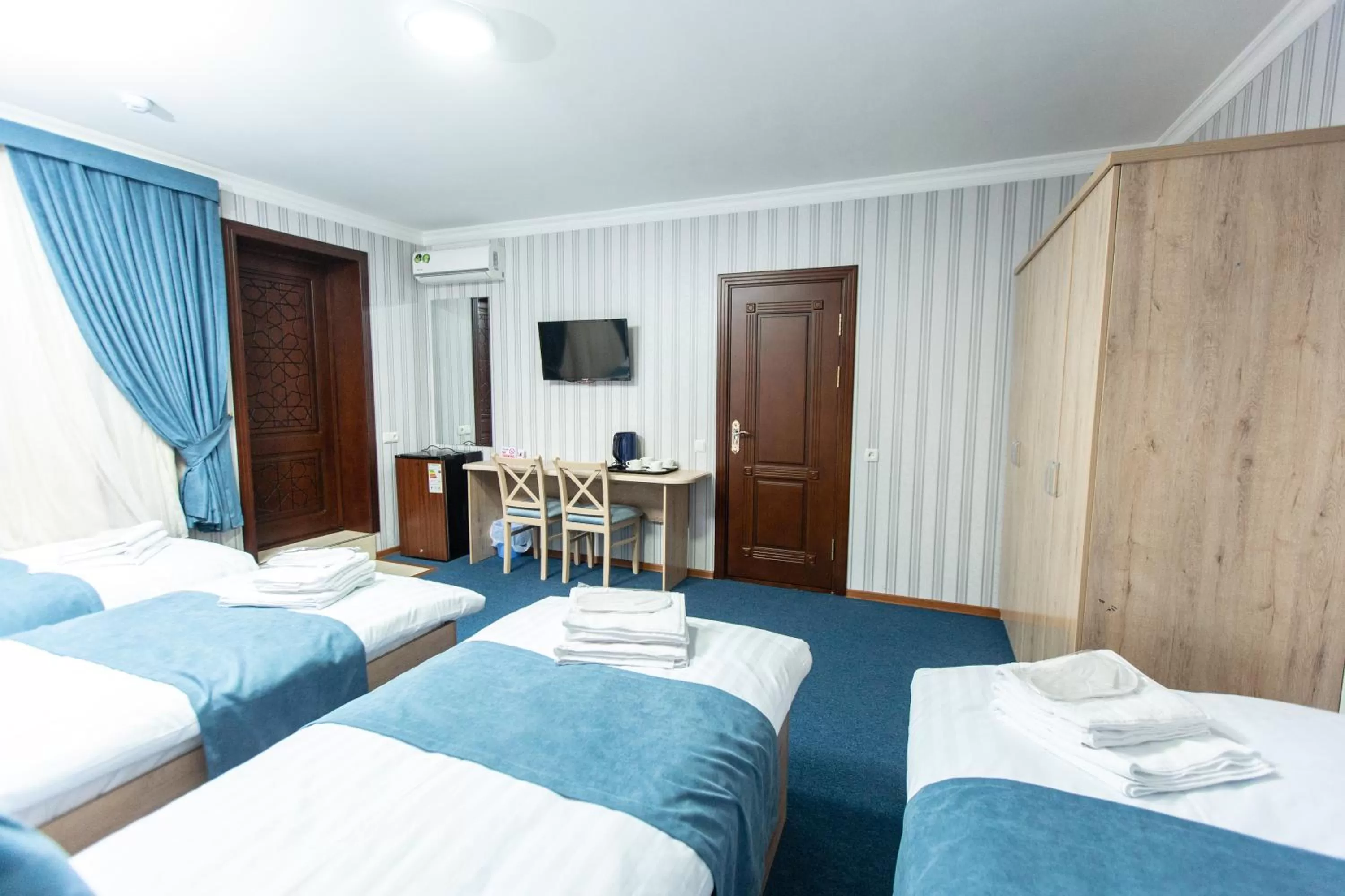 Bed in Mirzo Boutique Hotel