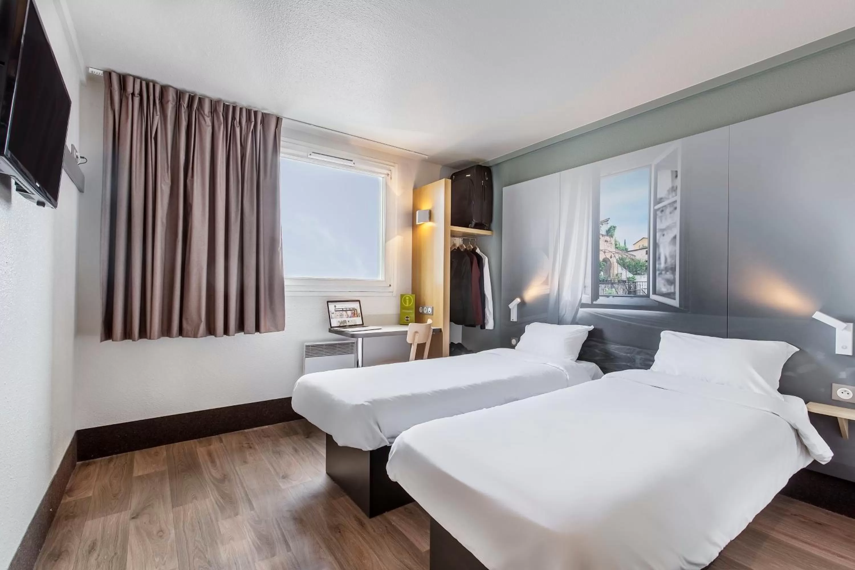 Bedroom, Bed in B&B HOTEL Lyon Grand Stade Meyzieu