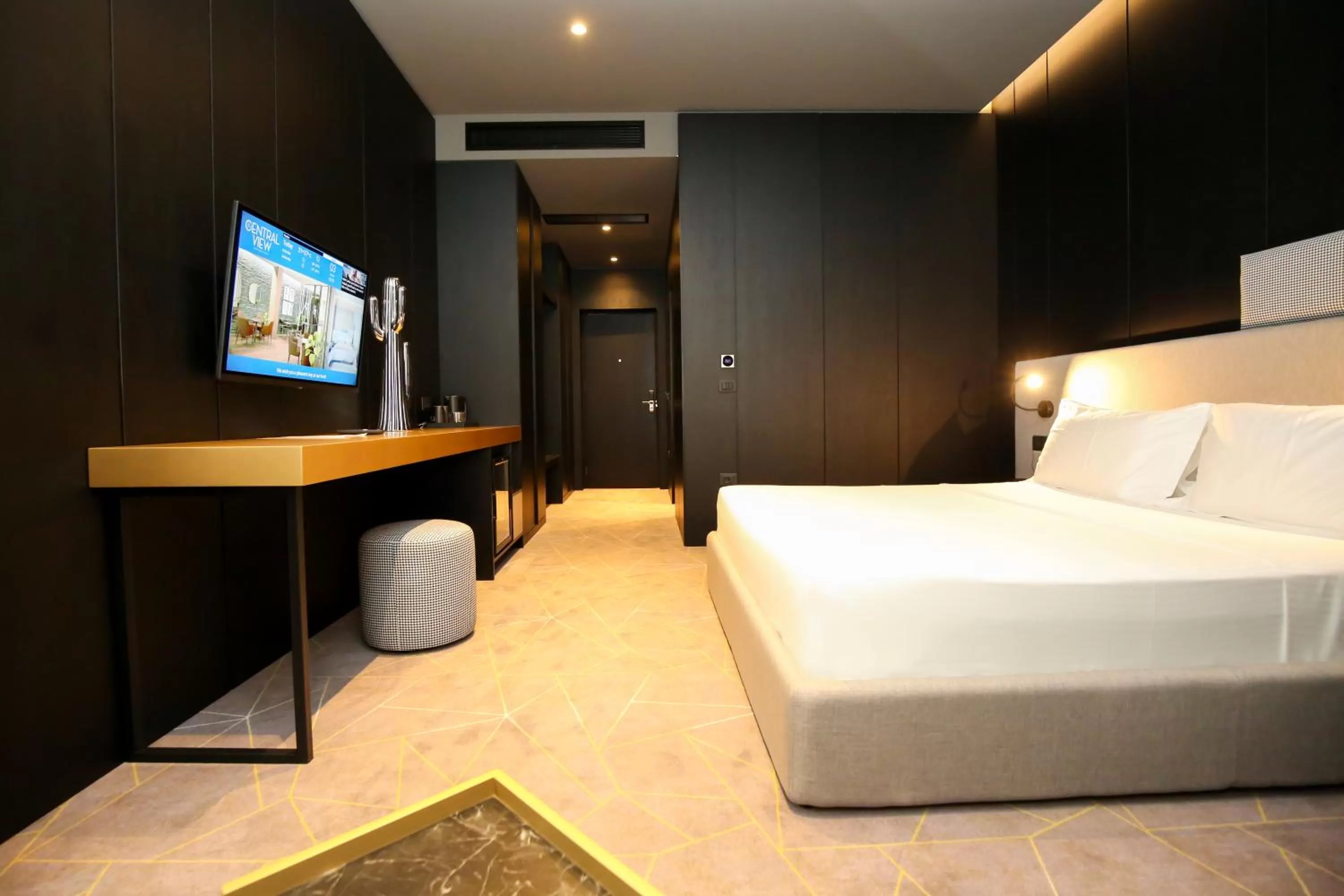 Photo of the whole room, Bed in The Central View Boutique Hotel