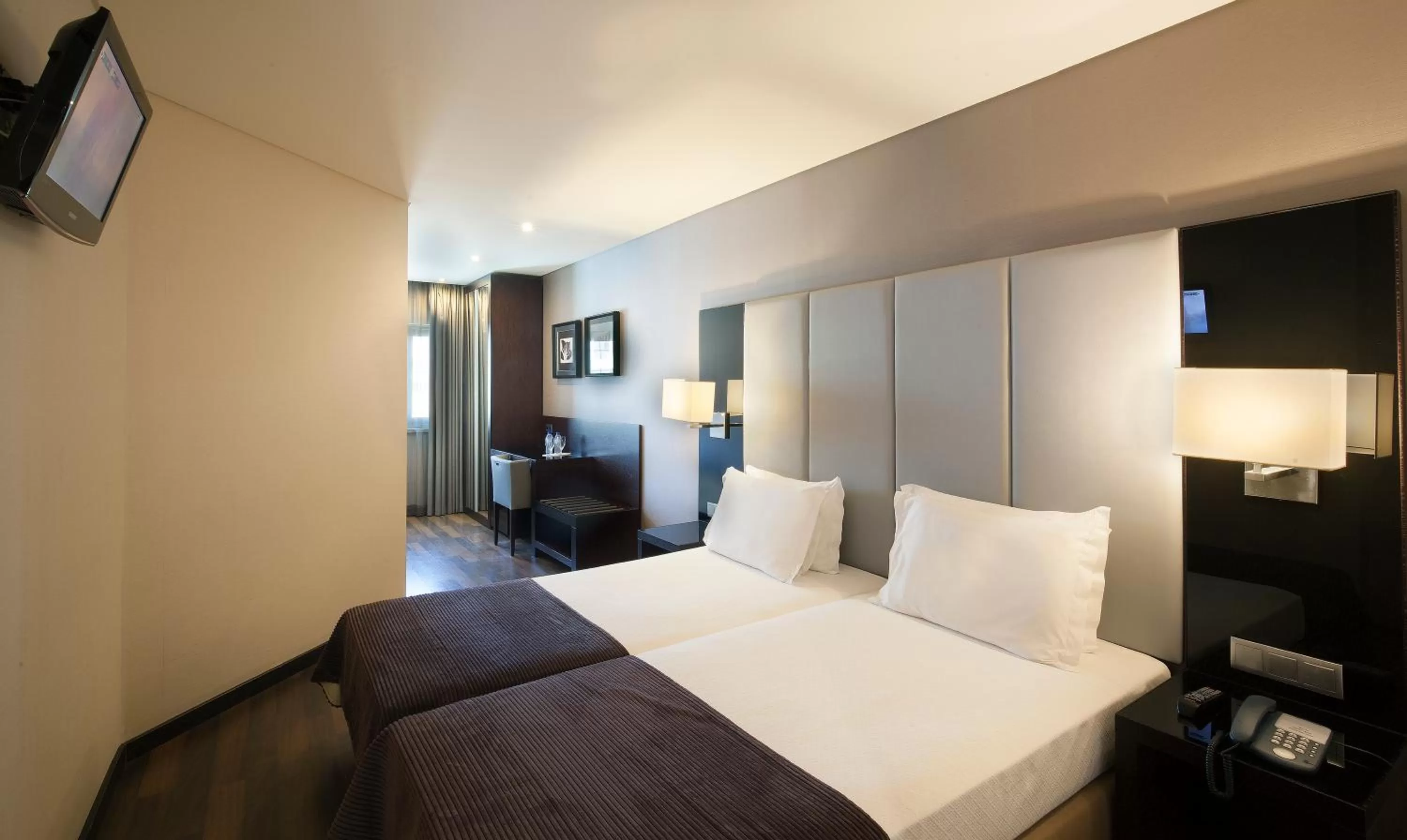 Bed in TURIM Luxe Hotel