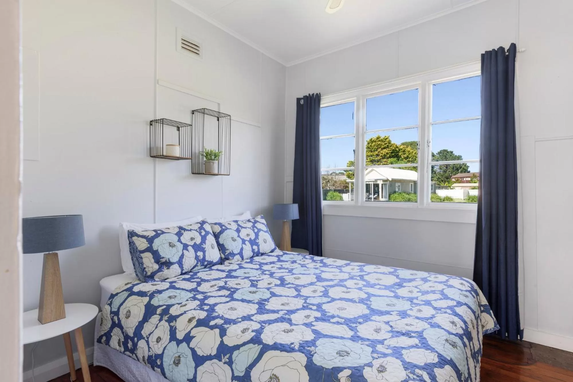 Bed in Calm Waters Waterfront Cottages