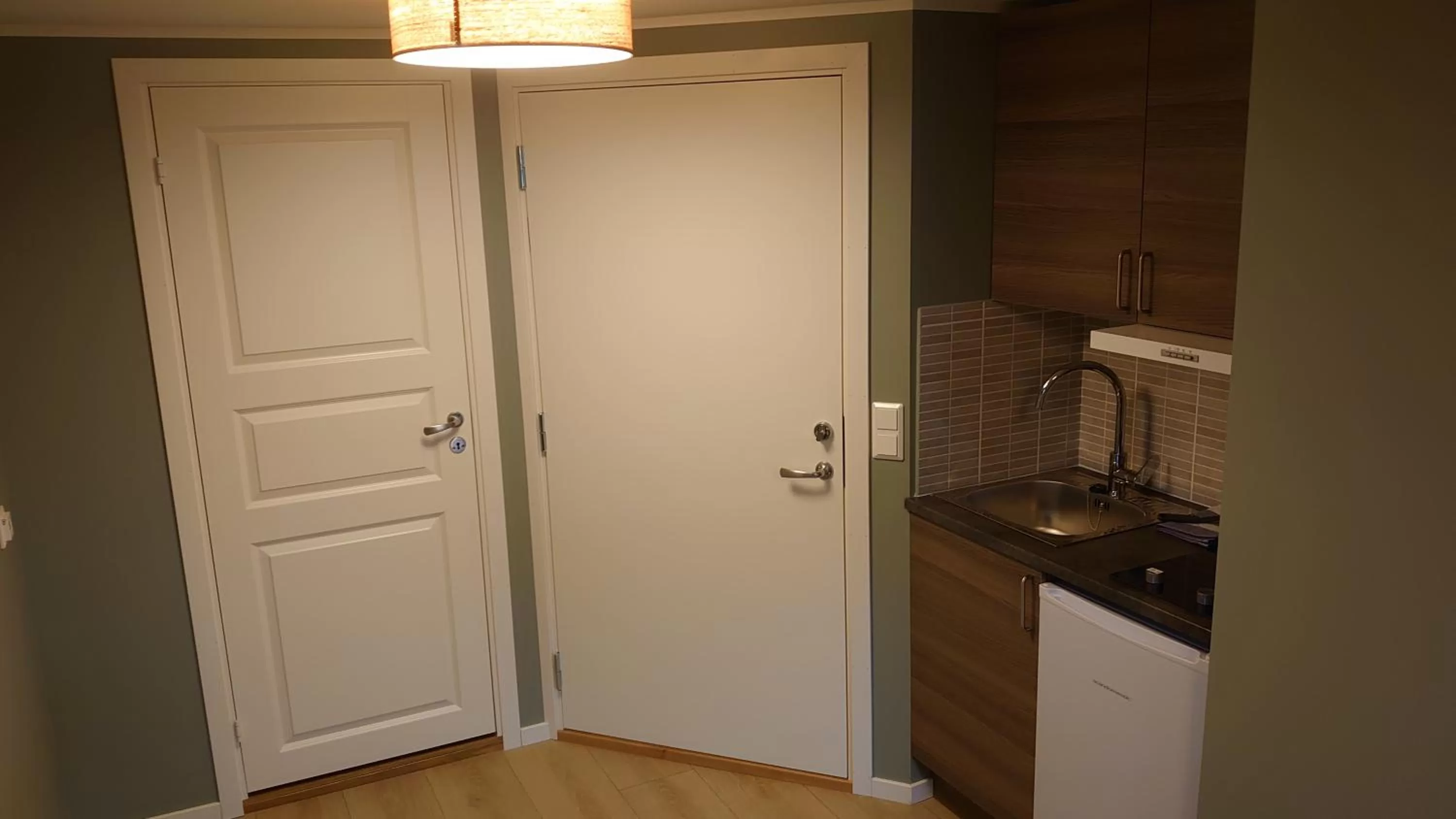 Kitchen or kitchenette in På Hjørnet Gjestehus