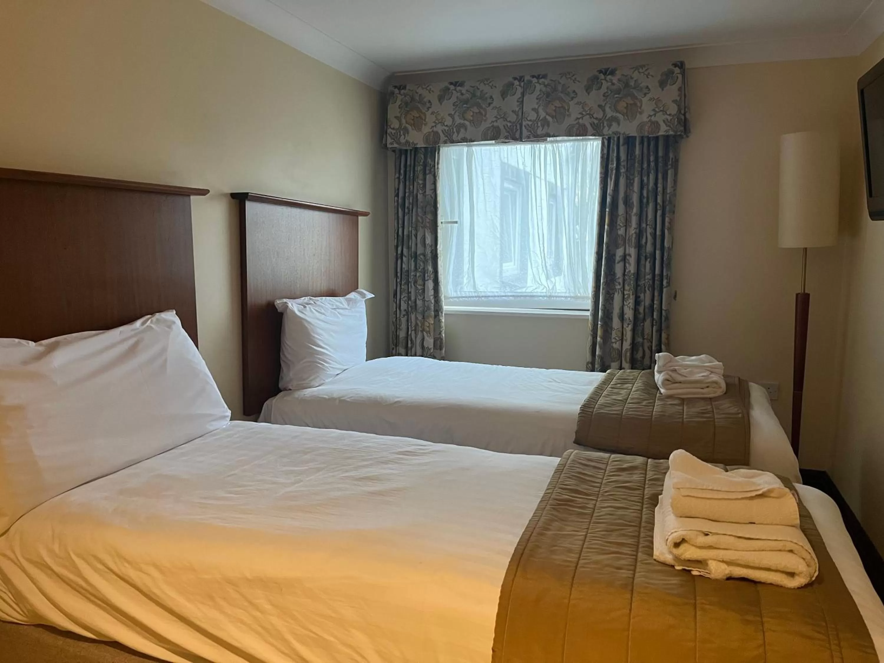 Bed in Macdonald Tickled Trout Hotel