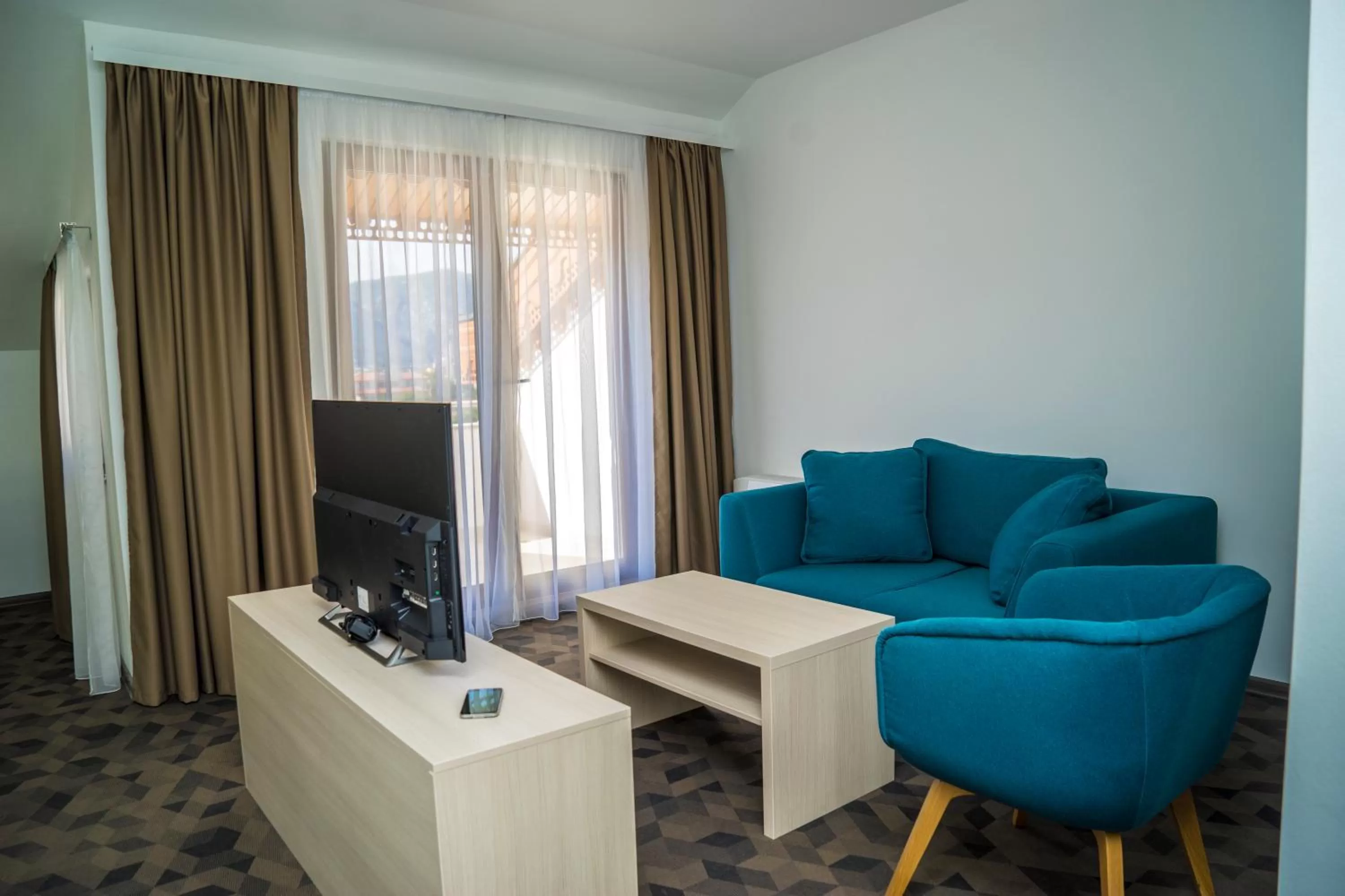 TV and multimedia, Seating Area in Hotel Kapetanovina