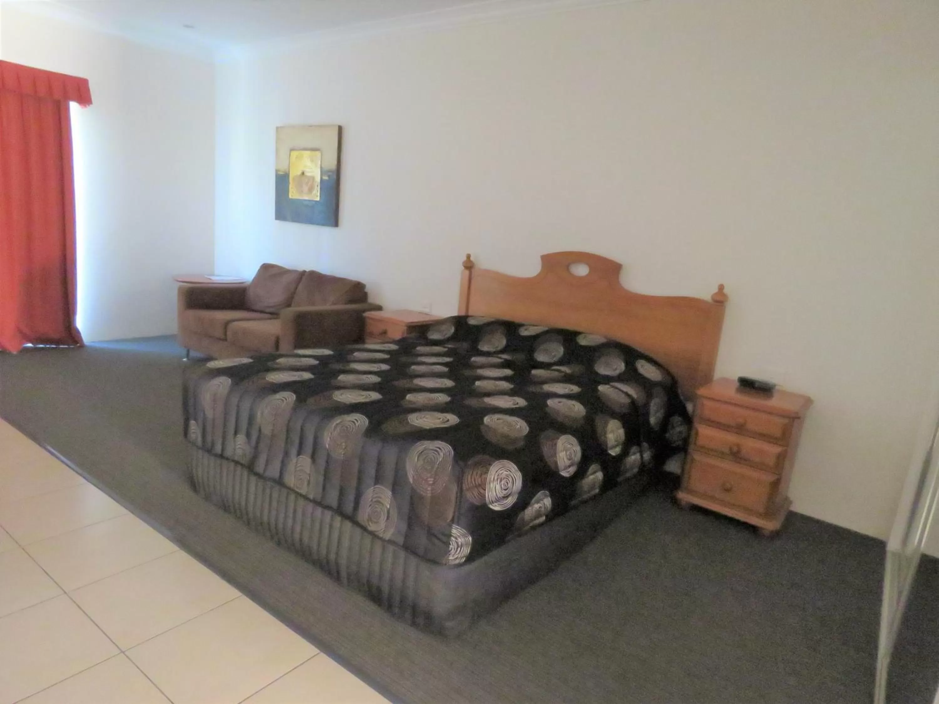 Bed in Emerald Gardens Motel & Apartments