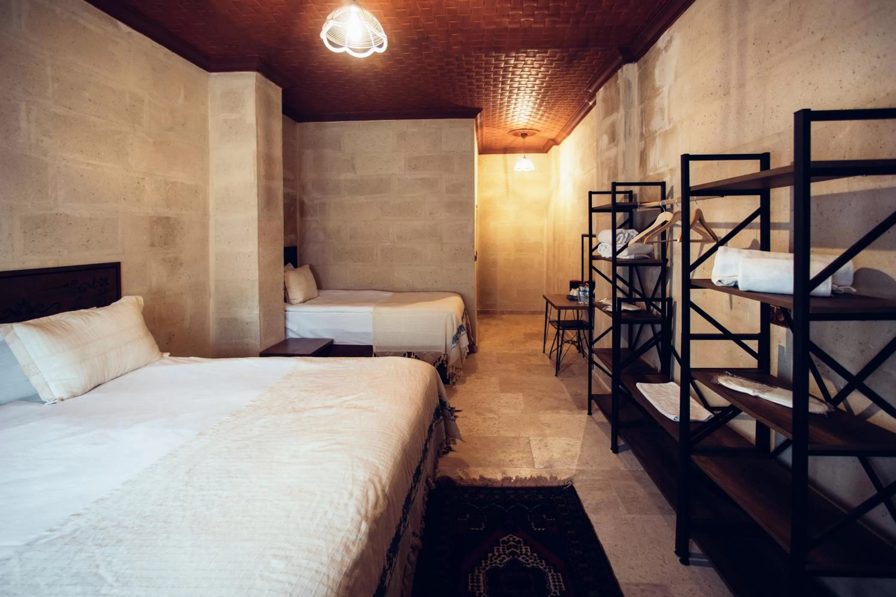 Bed in Azalea Terrace Cave Hotel