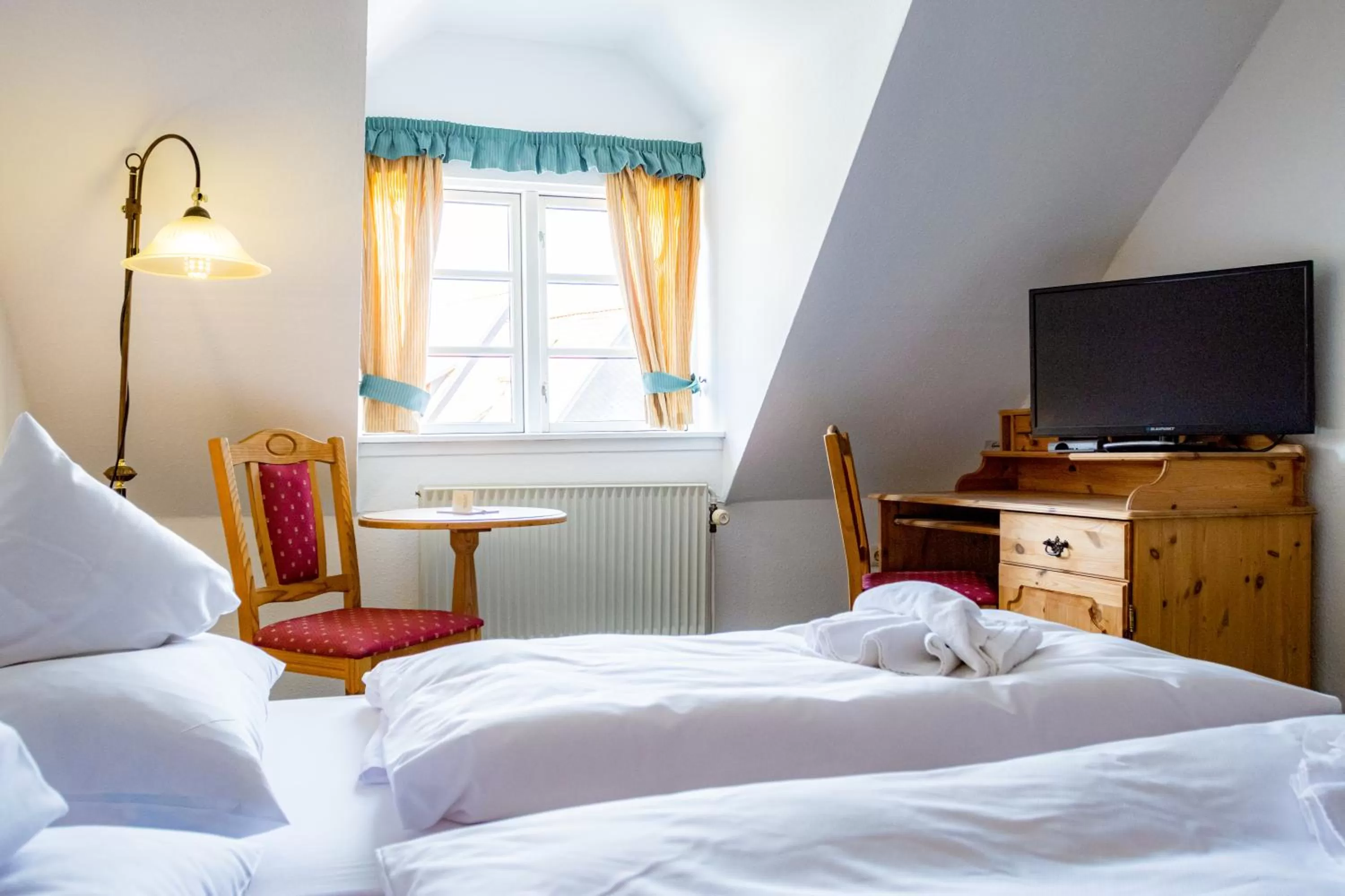 Photo of the whole room, Bed in Hotel & Restaurant Brauner Hirsch Osterwieck