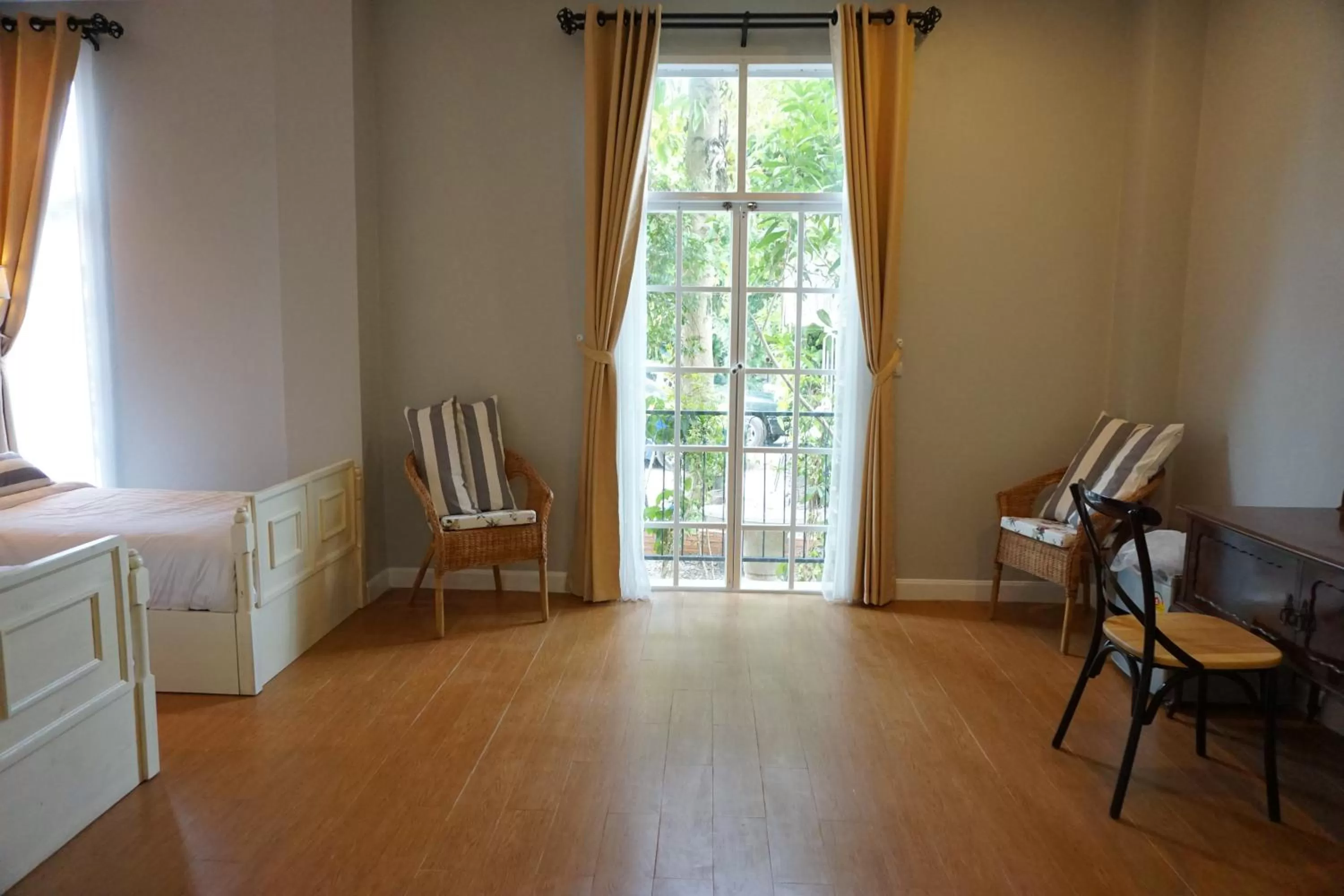 Bedroom in Nai Suan Bed and Breakfast