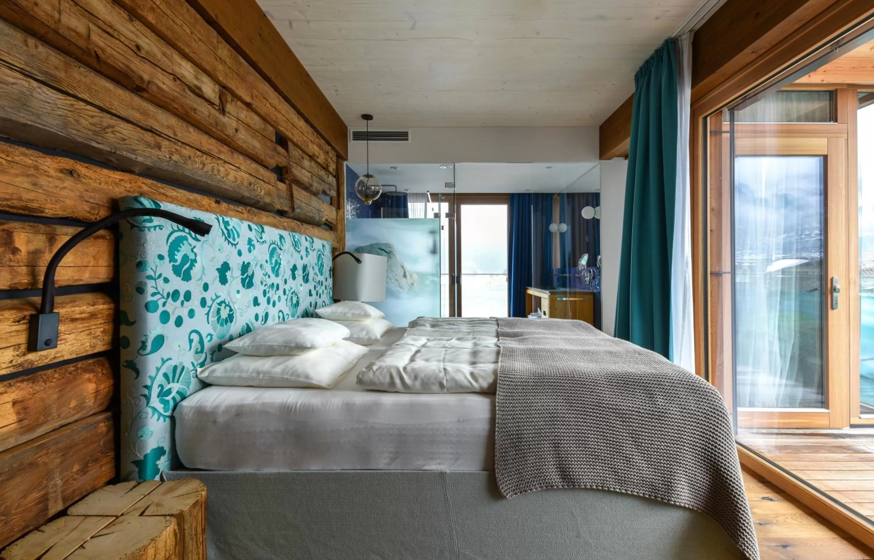 Bed in Small Luxury Hotel of the World - DasPosthotel