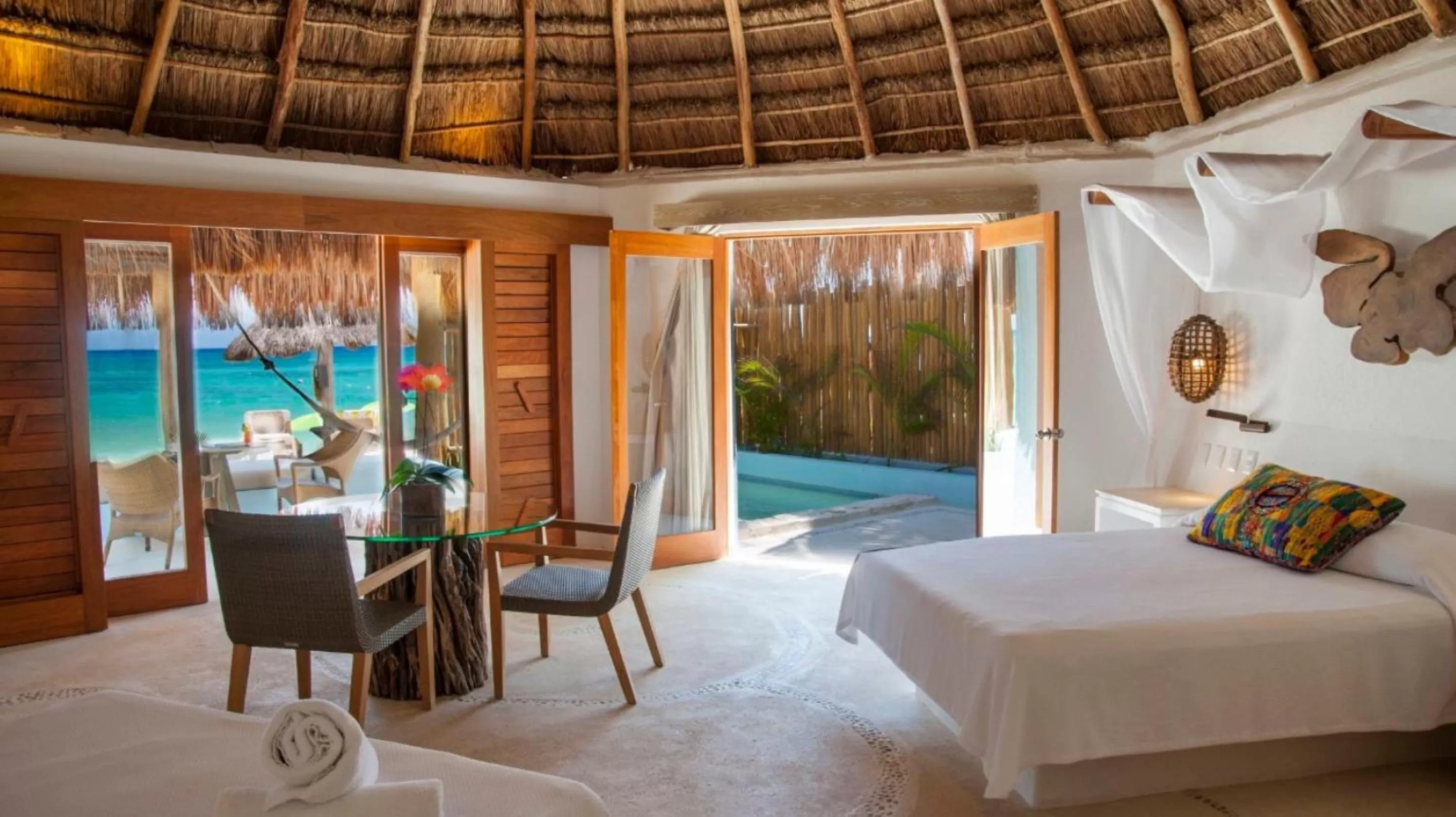 Bedroom, Bed in Mahekal Beach Front Resort & Spa