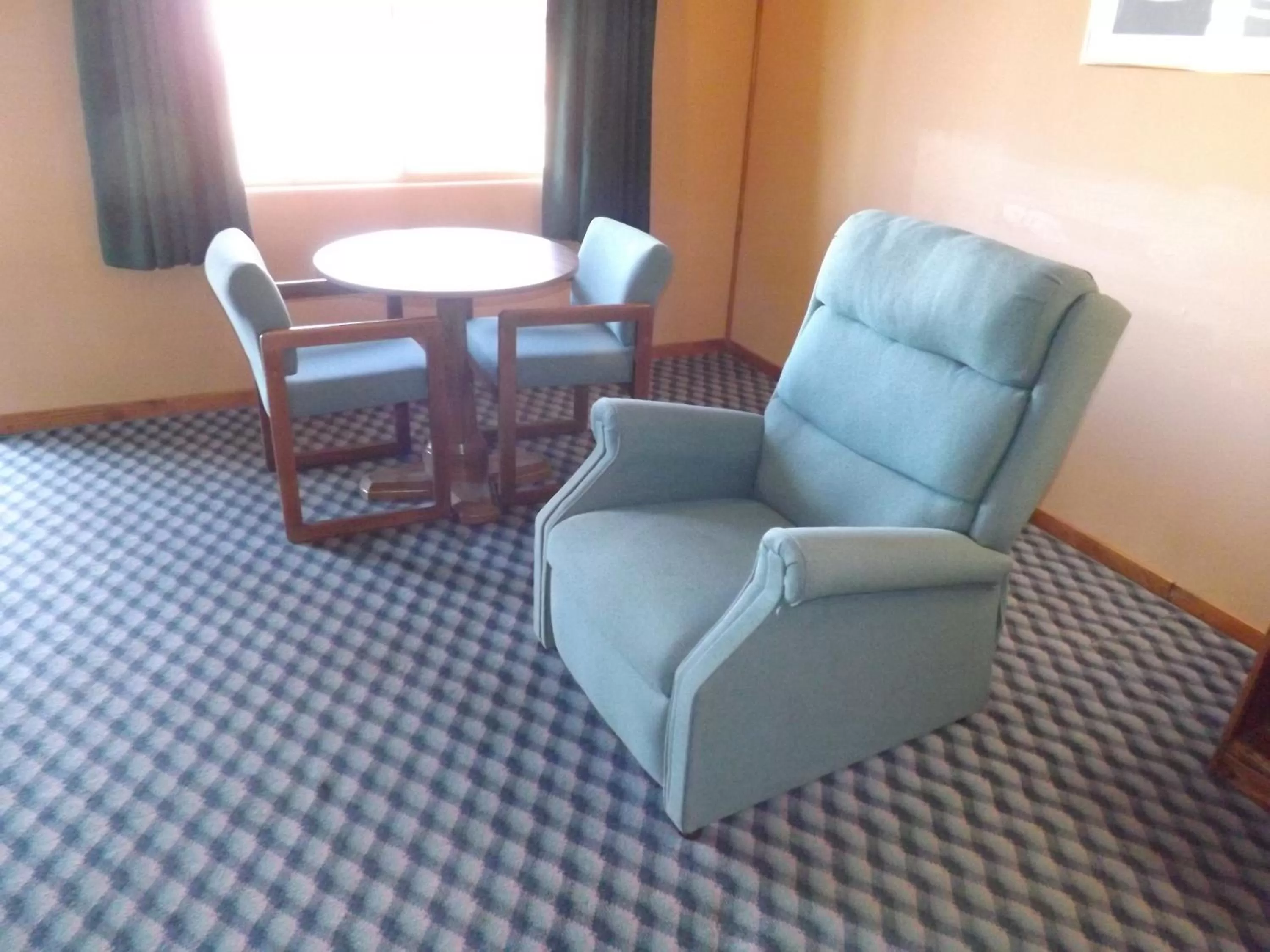 Seating area in Tristar Inn Xpress