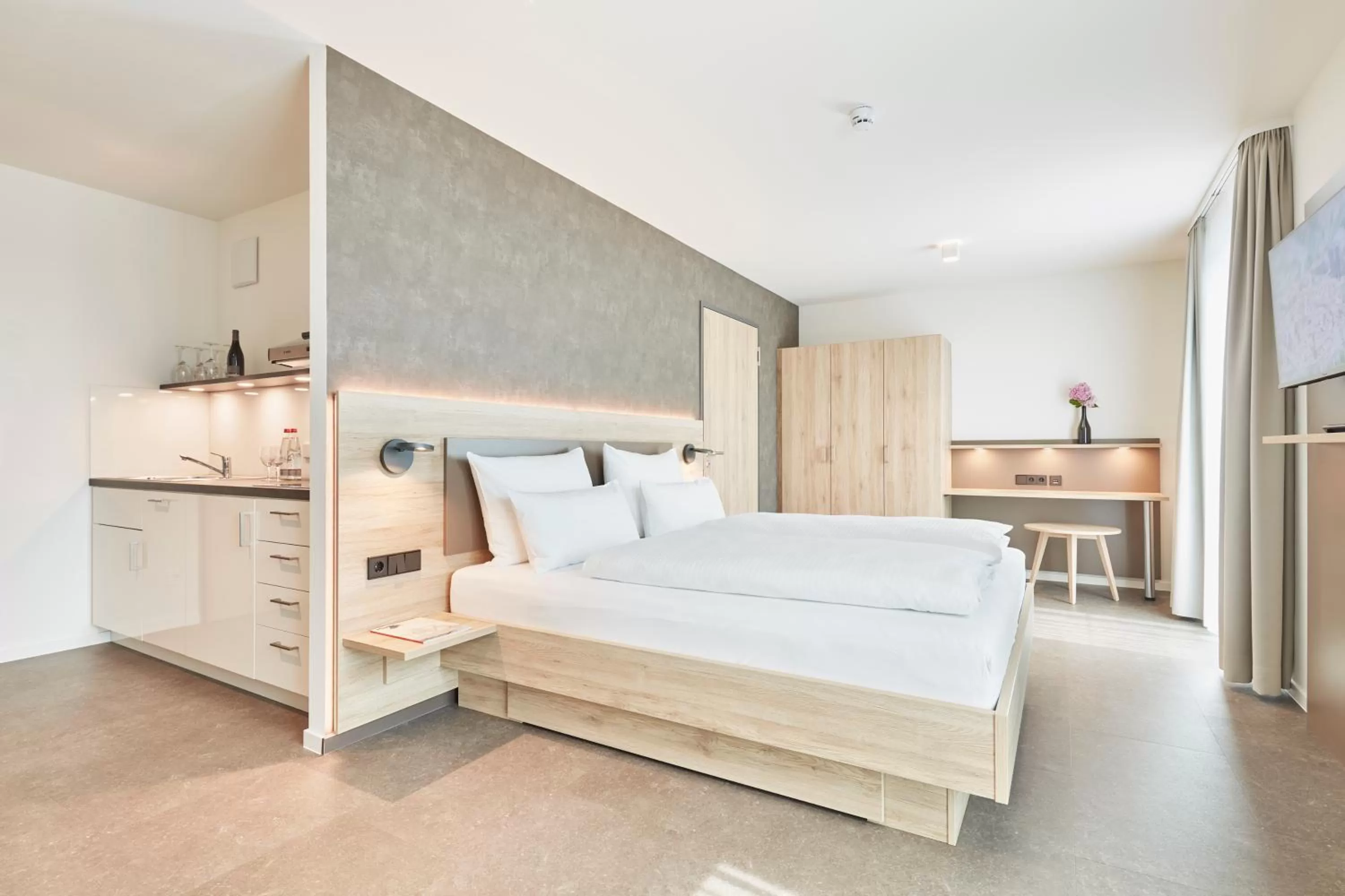 Bed in Gästehaus Bauer - Schlafen auf dem Weingut