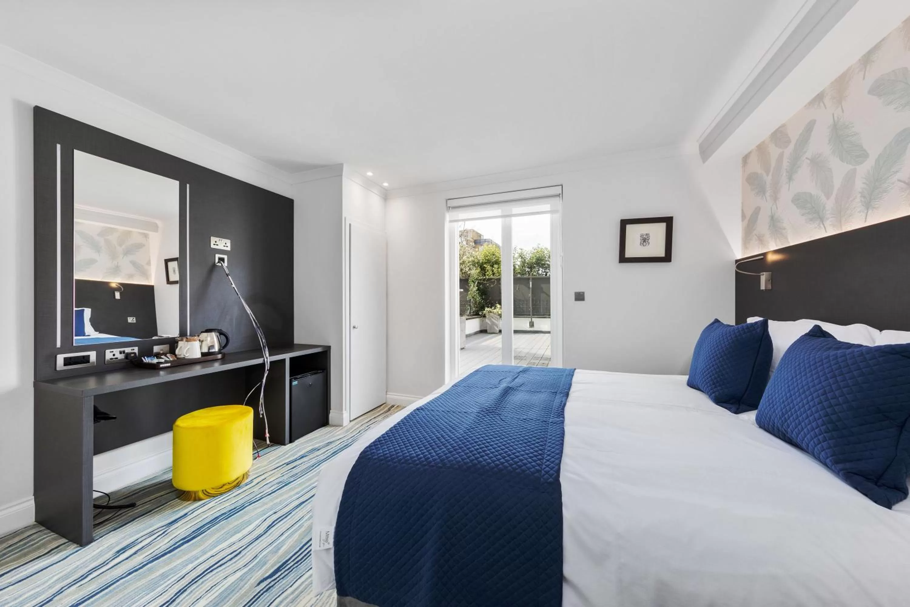 Bed in Commodore Hotel