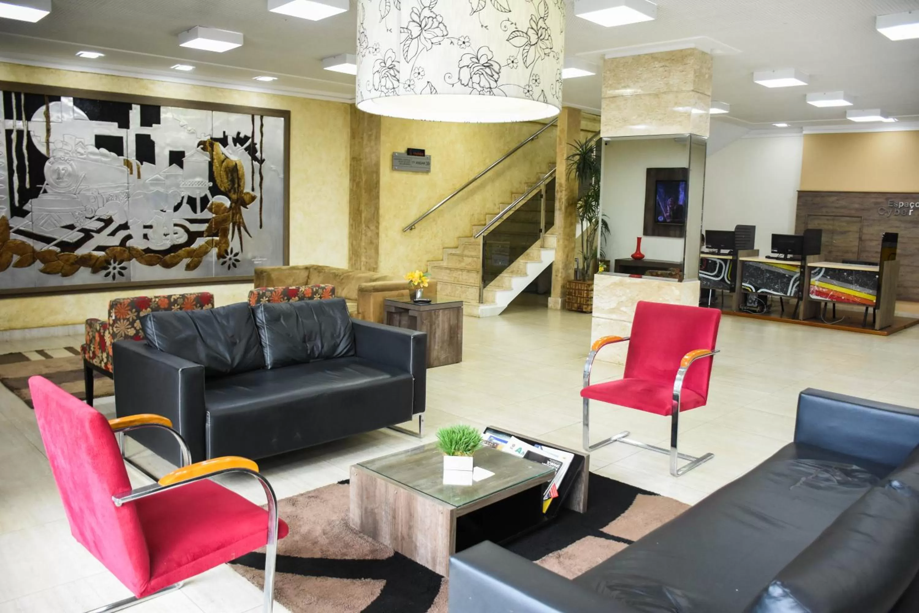 Living room in Larison Executive - by Easy Hotéis