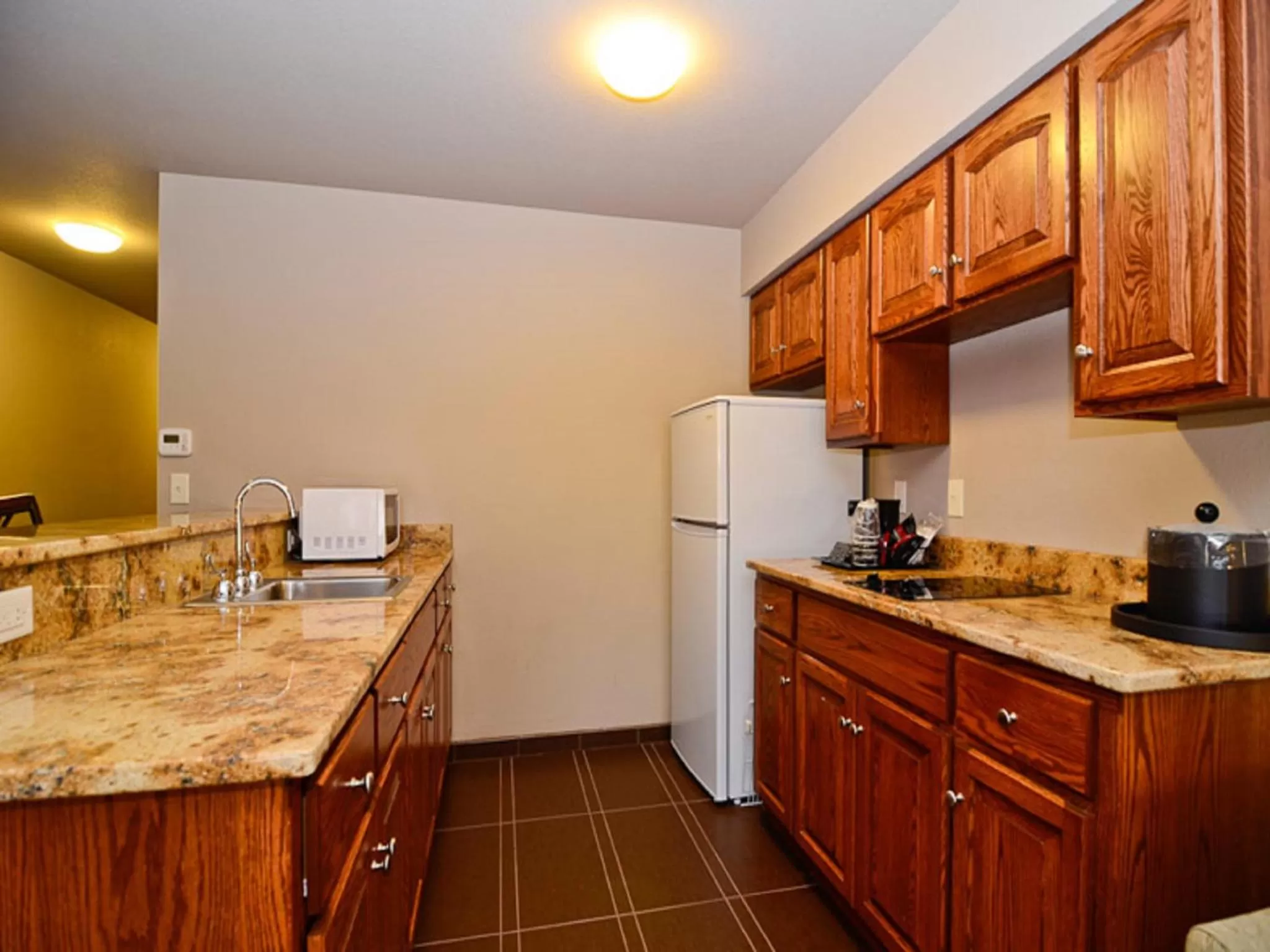 Kitchen or kitchenette in Astoria Hotel & Event Center