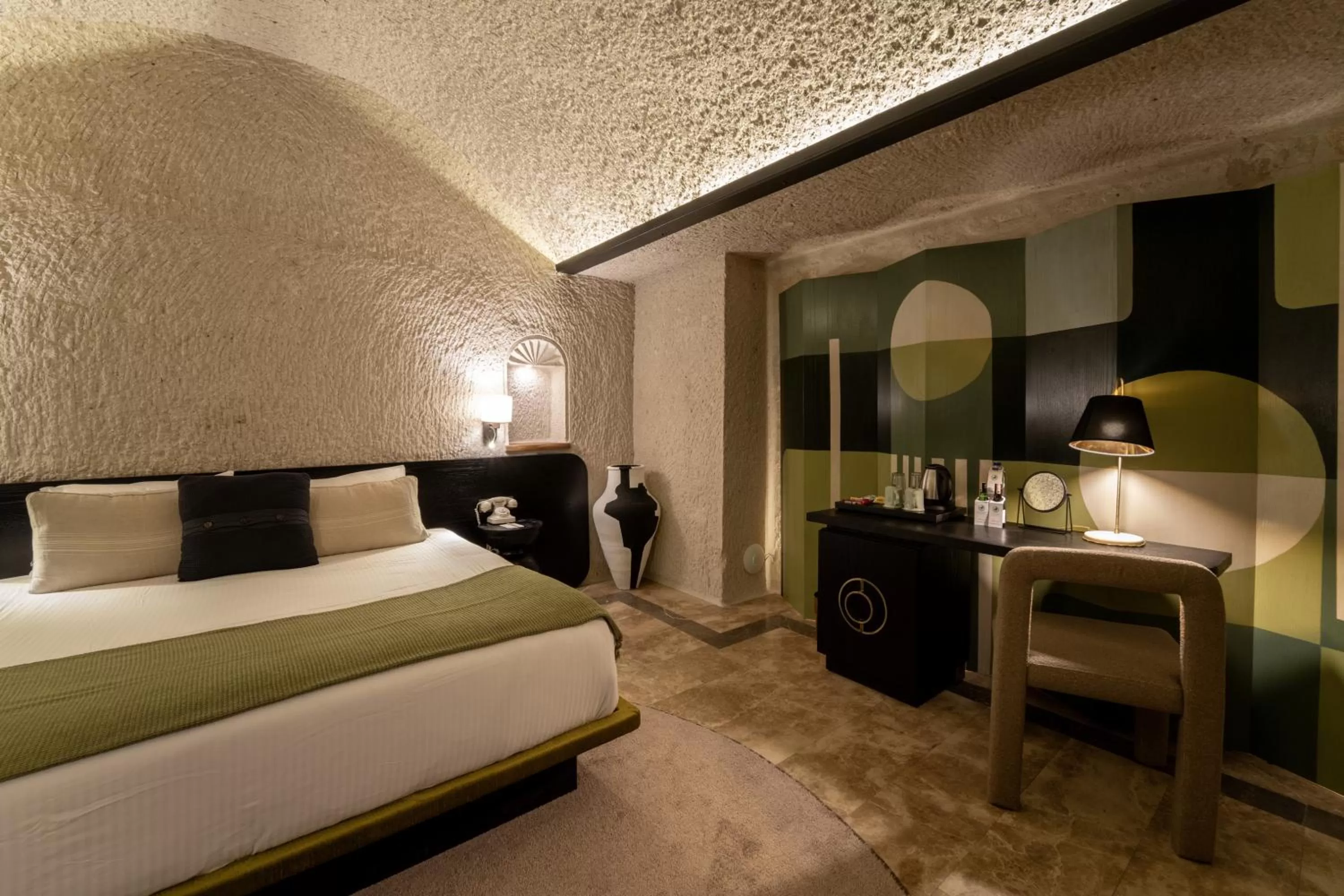 Bedroom, Bed in Artemis Cave Suites & Spa- Adults Only