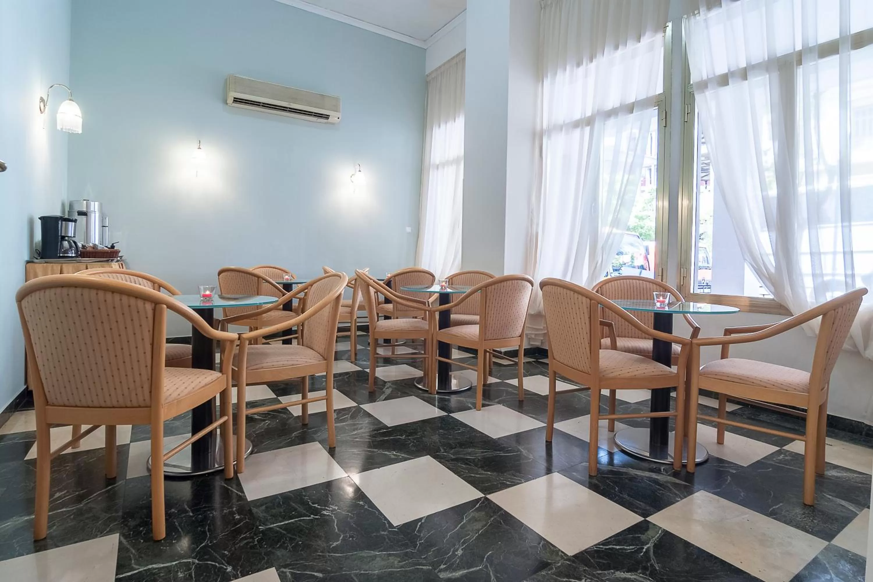 Communal lounge/ TV room in Ares Athens Hotel