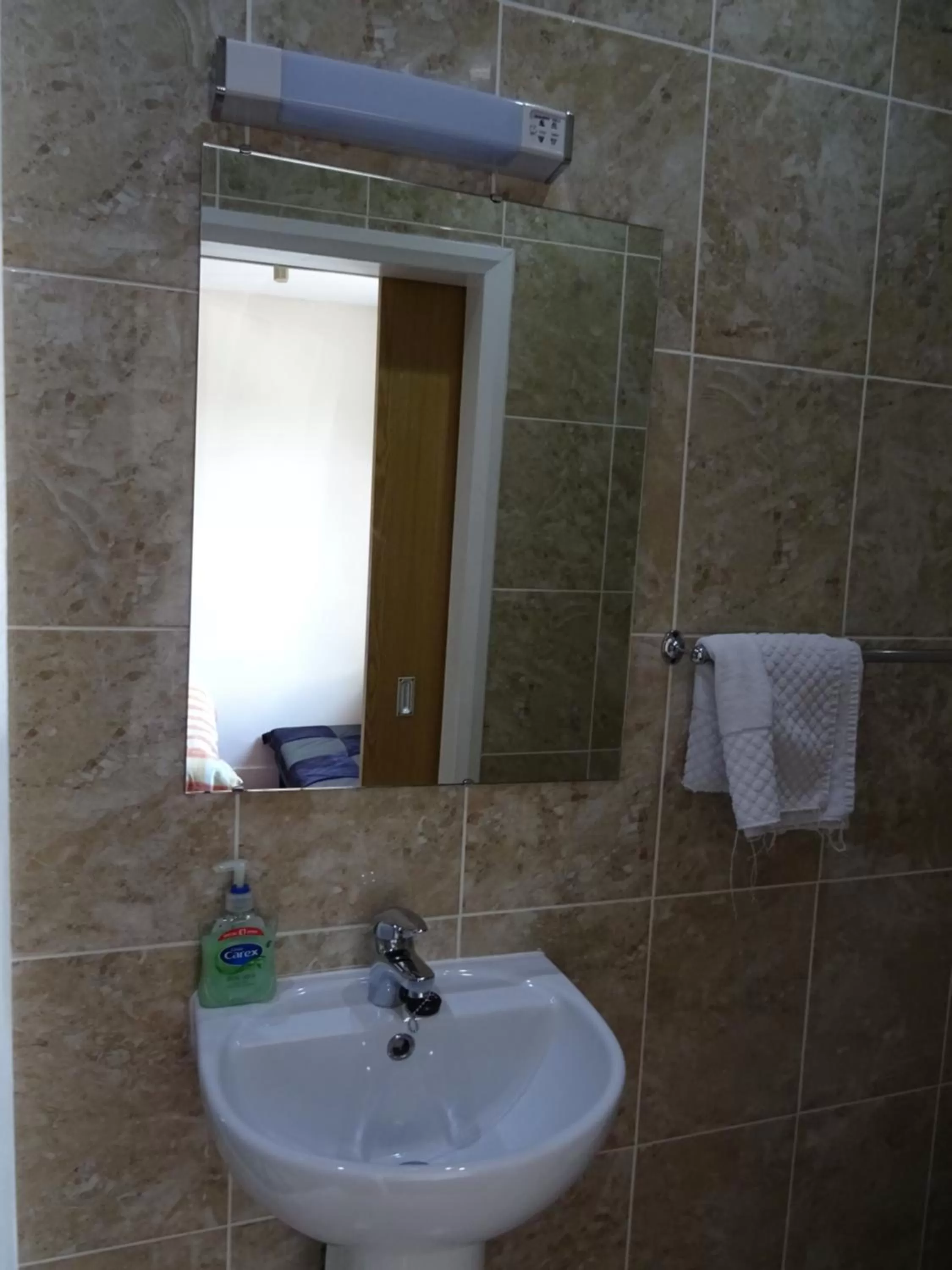 Bathroom in The Gatwick White House Hotel