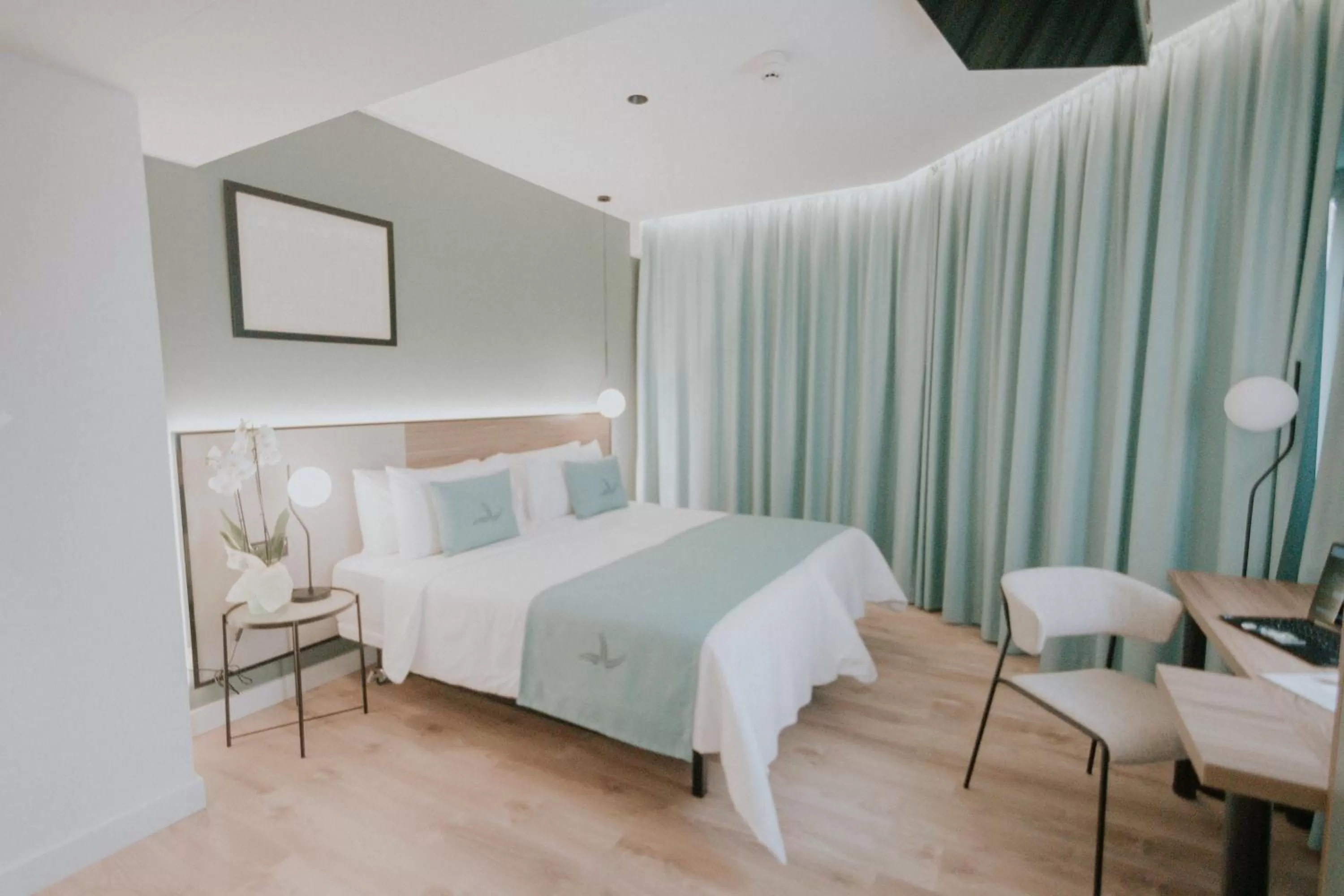 Bed in Catalina Plaza Hotel Sostenible