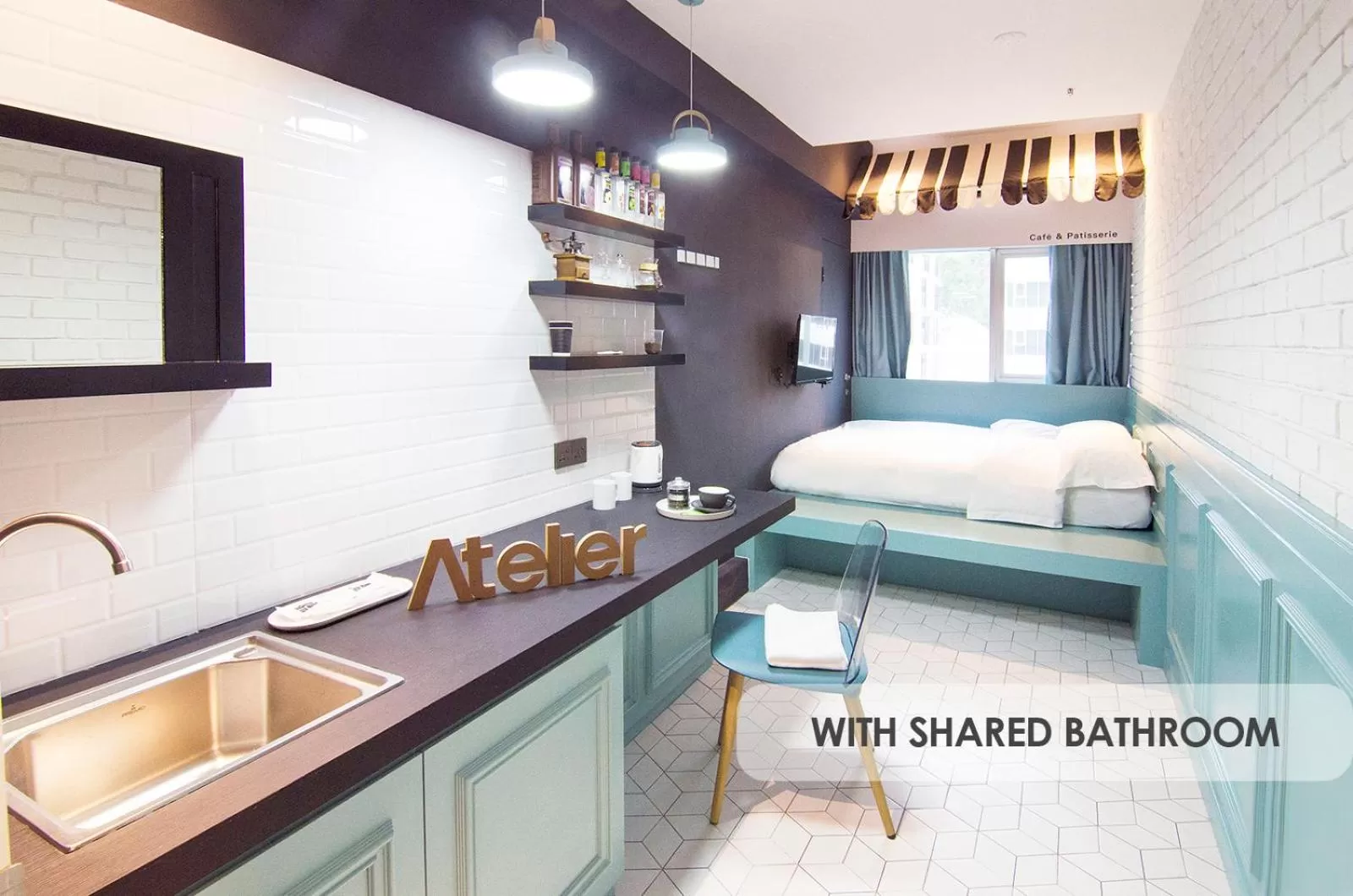 Bed in The Atelier Boutique Hotel