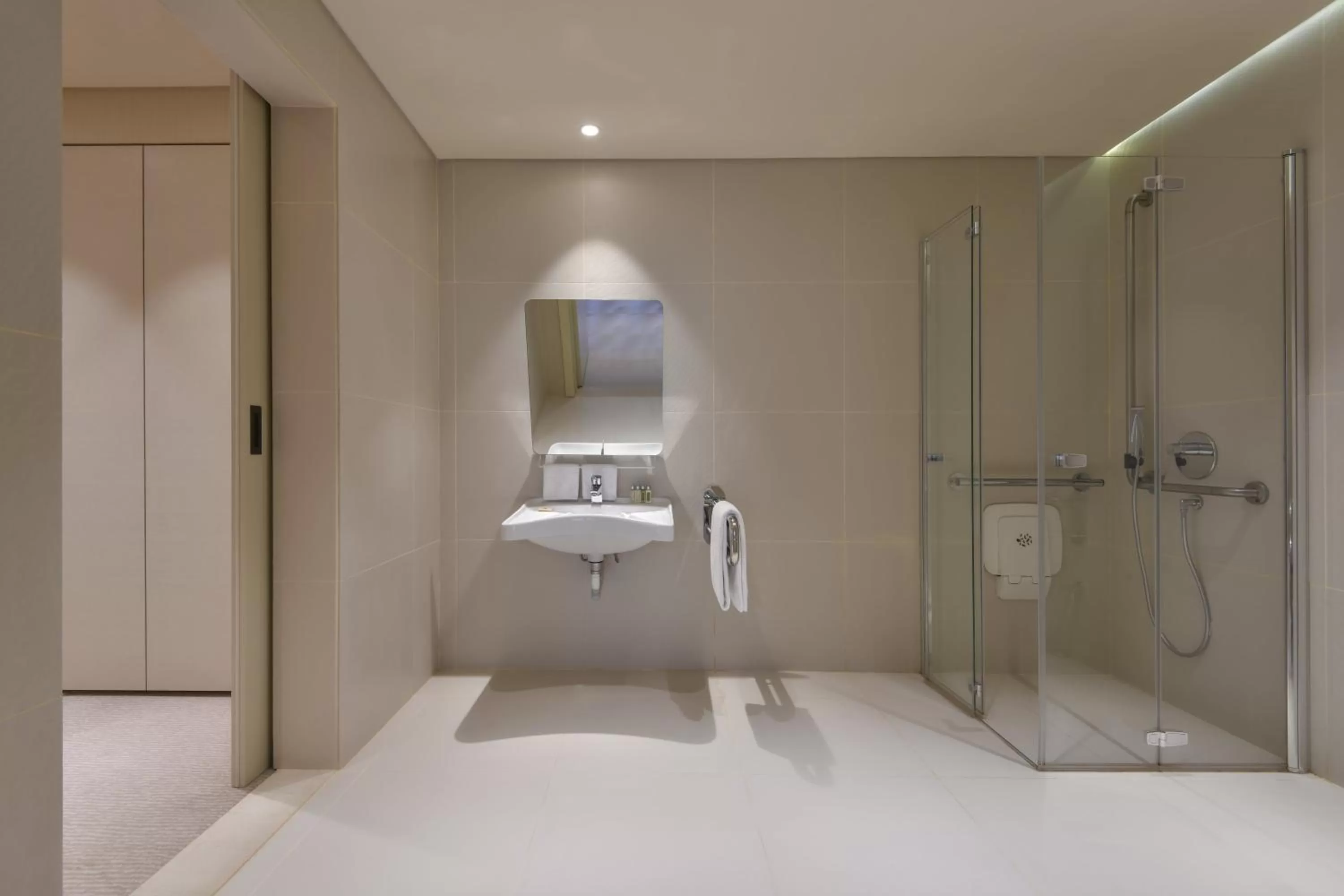 Bathroom, Bed in voco Doha West Bay Suites by IHG