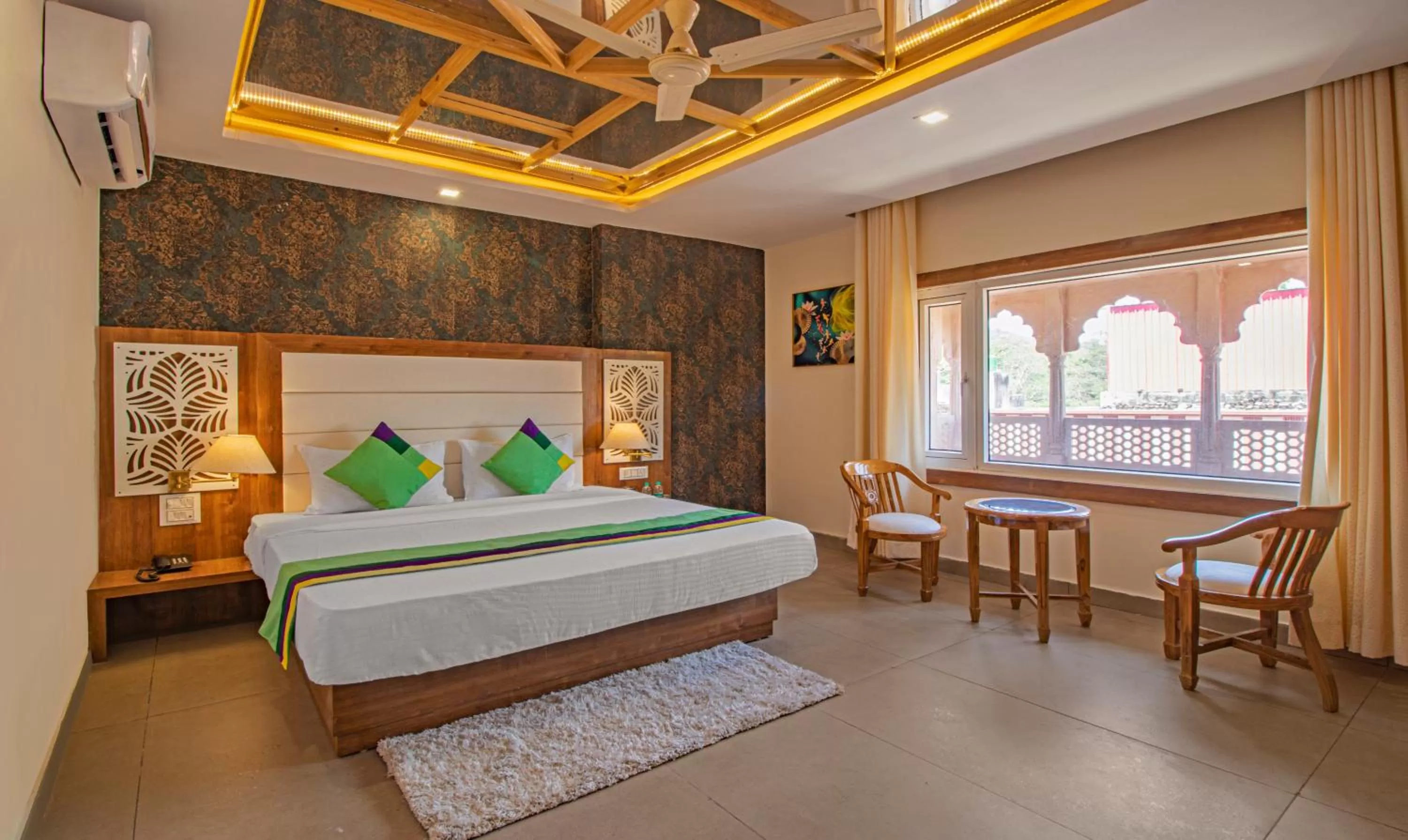 Bed in Treebo Trend Haveli Resort Roots Bhupatwala