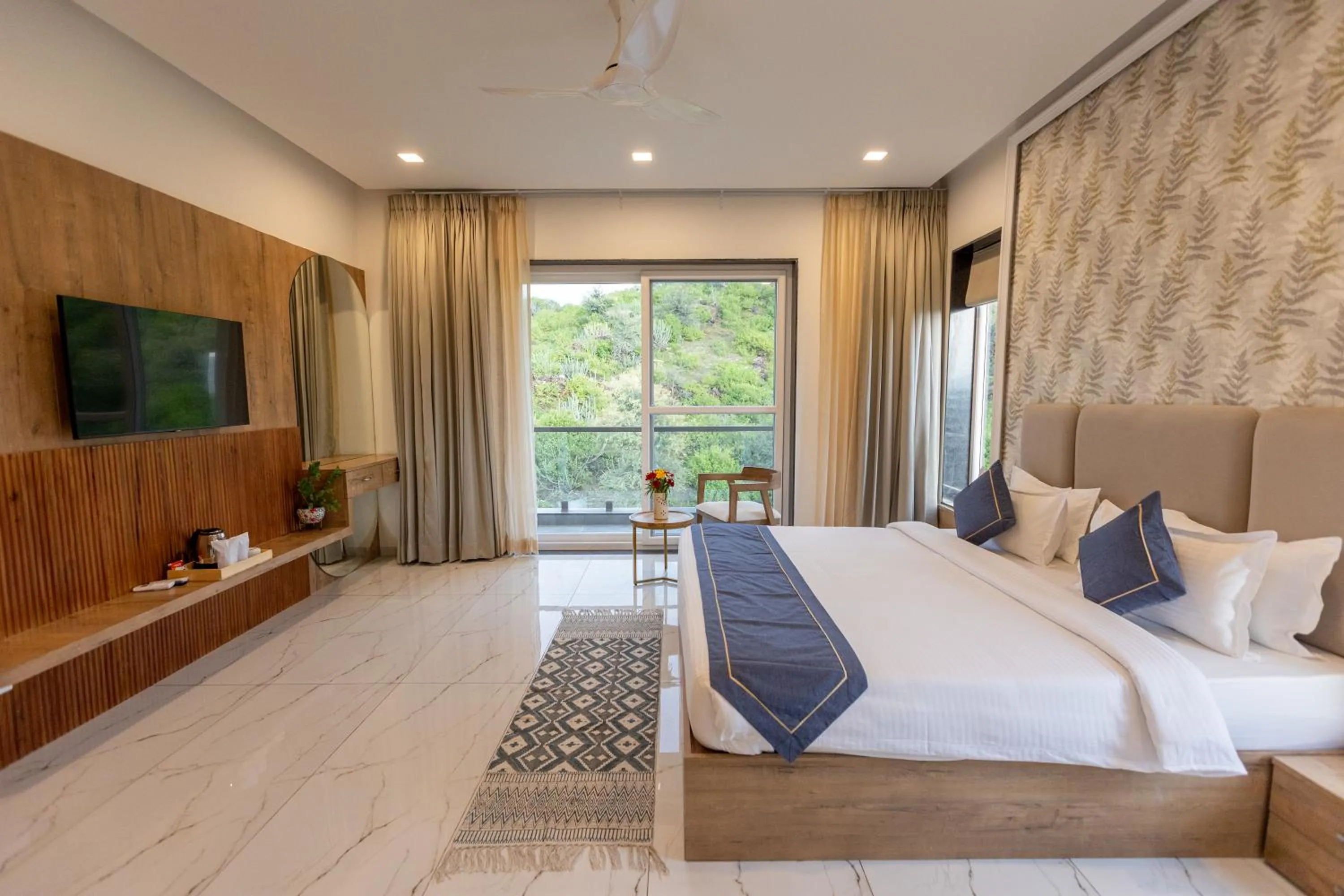 Bed in SURAMYA-A Luxury Boutique Hotel