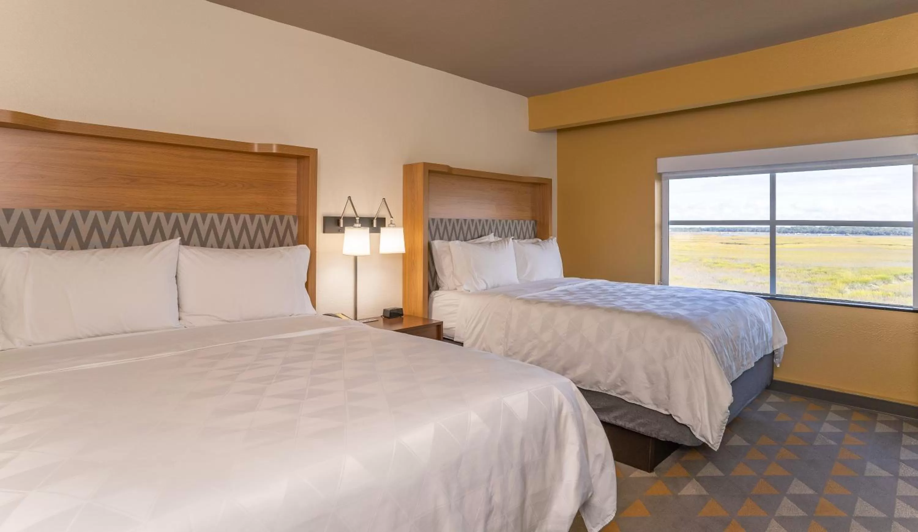 Bedroom, Bed in Holiday Inn Hotel & Suites Beaufort at Highway 21 by IHG