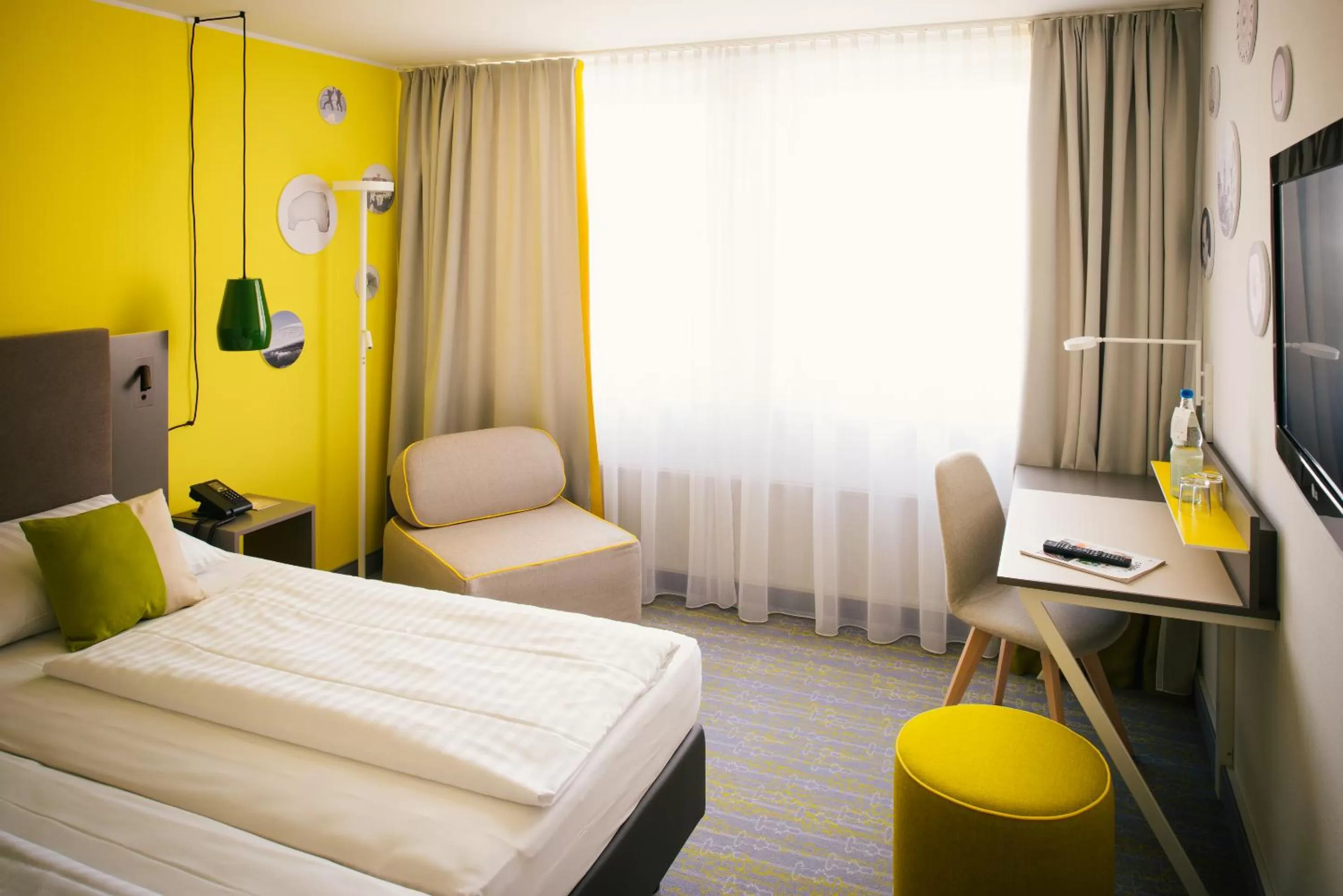 Seating area, Bed in Vienna House Easy by Wyndham Coburg