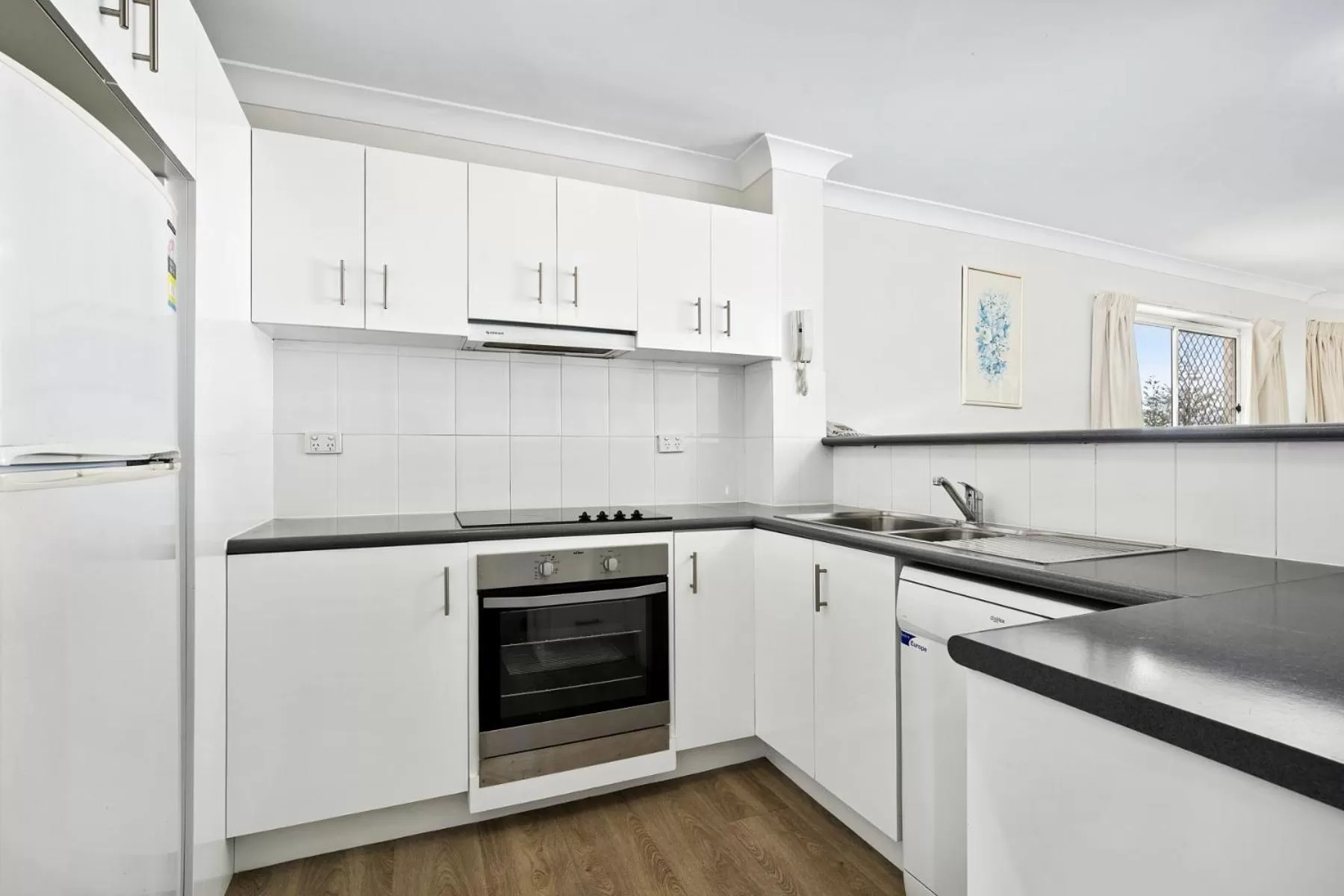 Kitchen or kitchenette in Kirra Palms Holiday Apartments