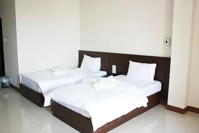 Bed in Amatara Hotel