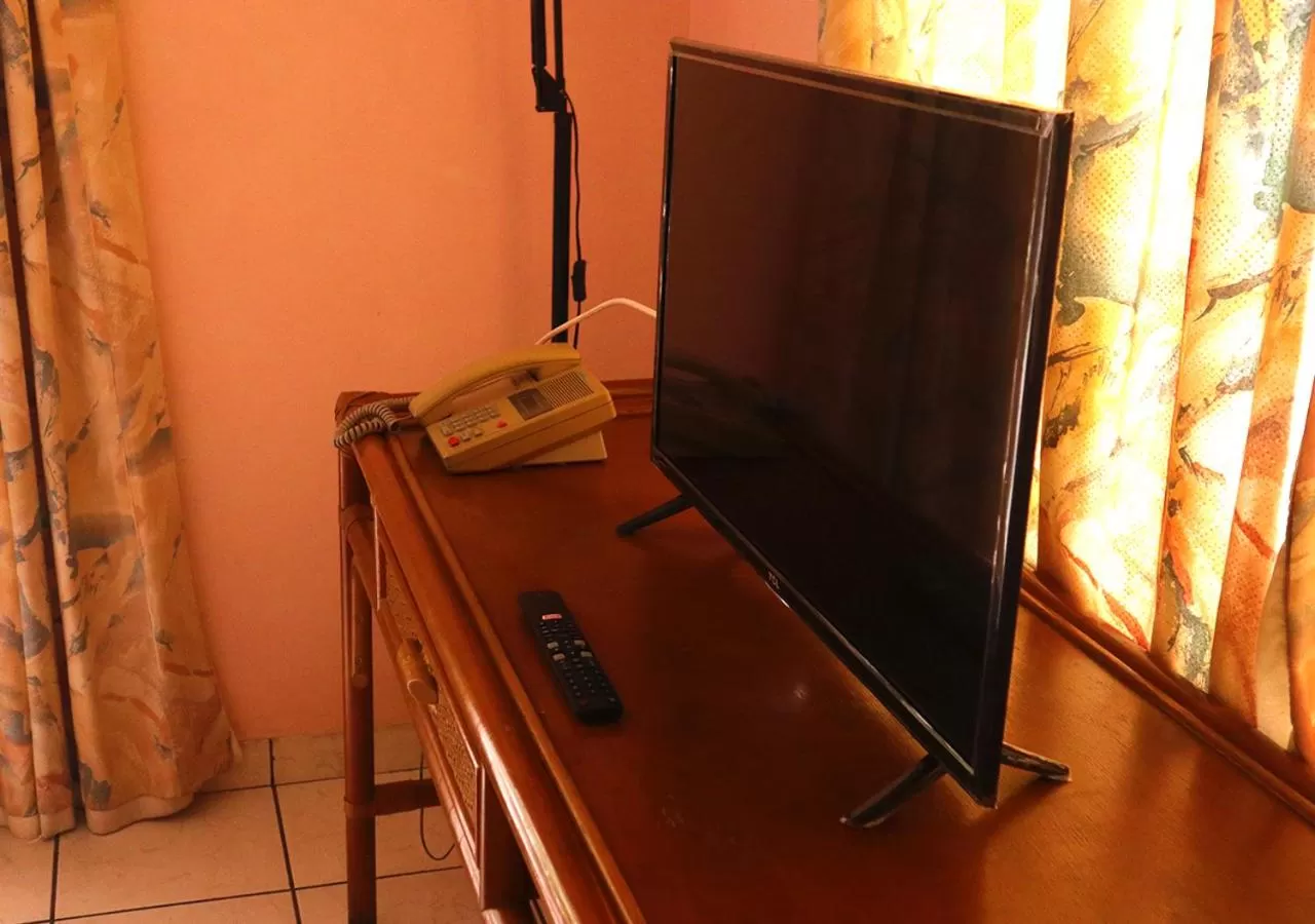 TV and multimedia, TV/Entertainment Center in Zeelandia Suites