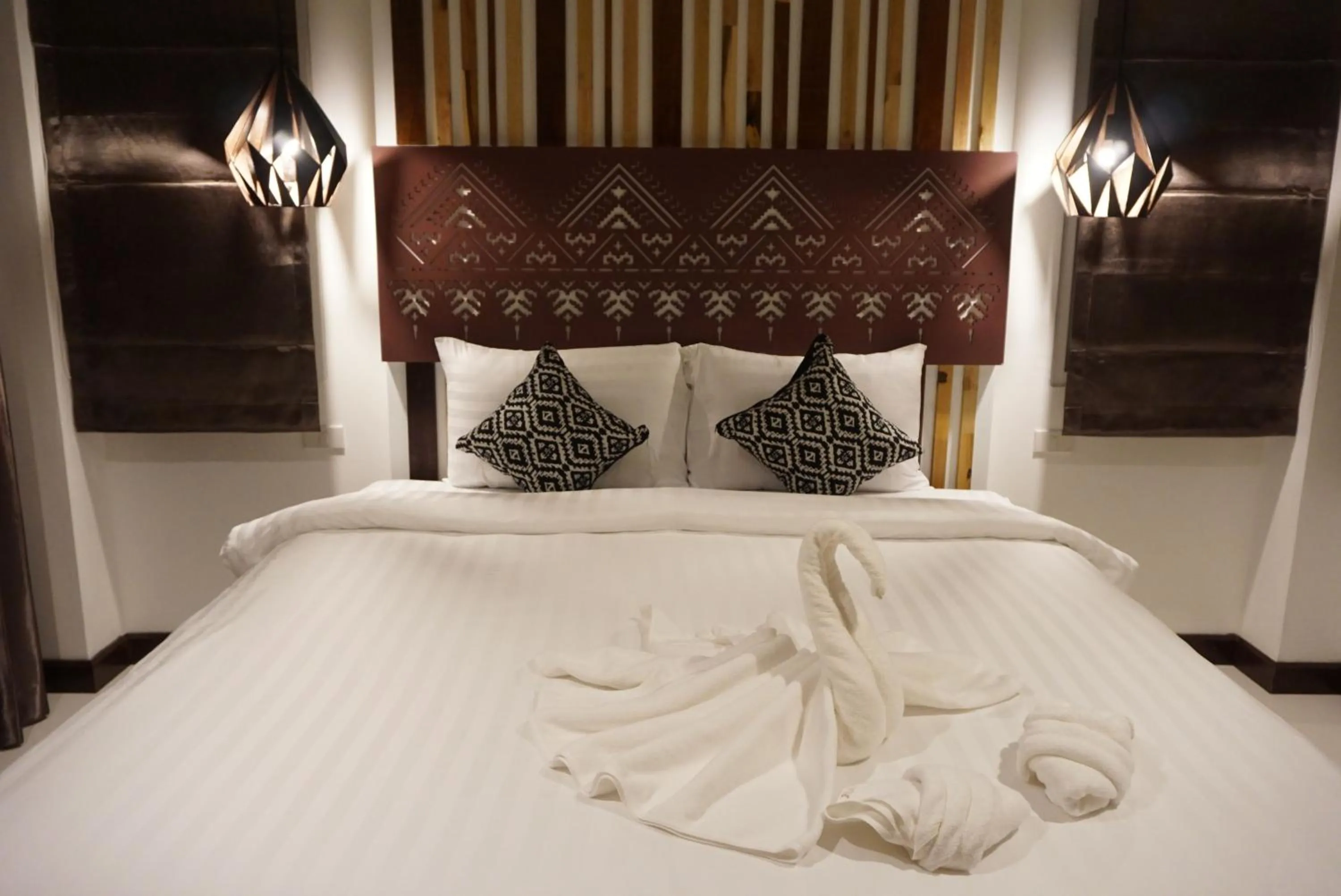 Bed in My Chiangmai Boutique Lodge