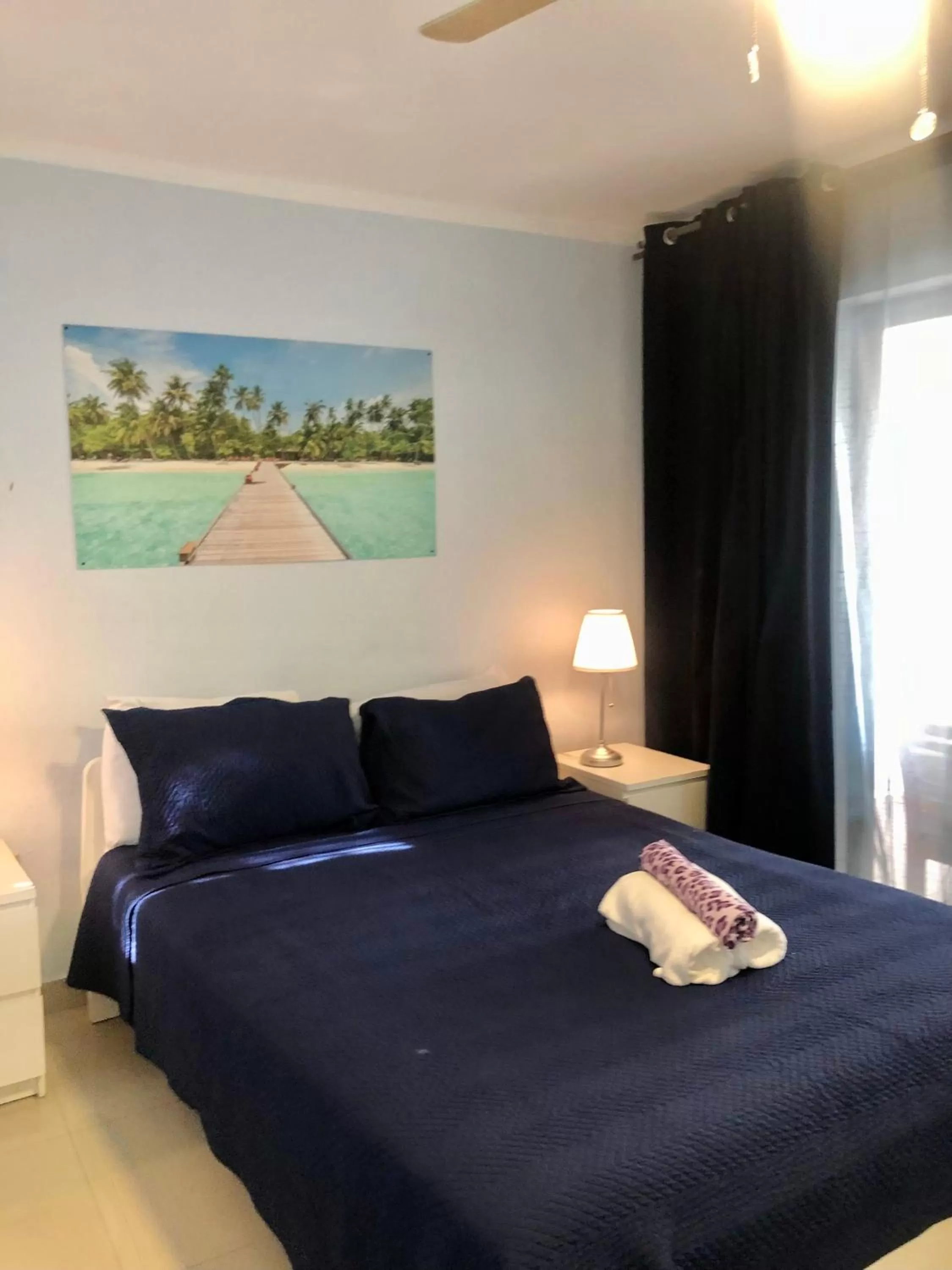 Bed in Los Corales Luxury Villas Beach Club and Spa