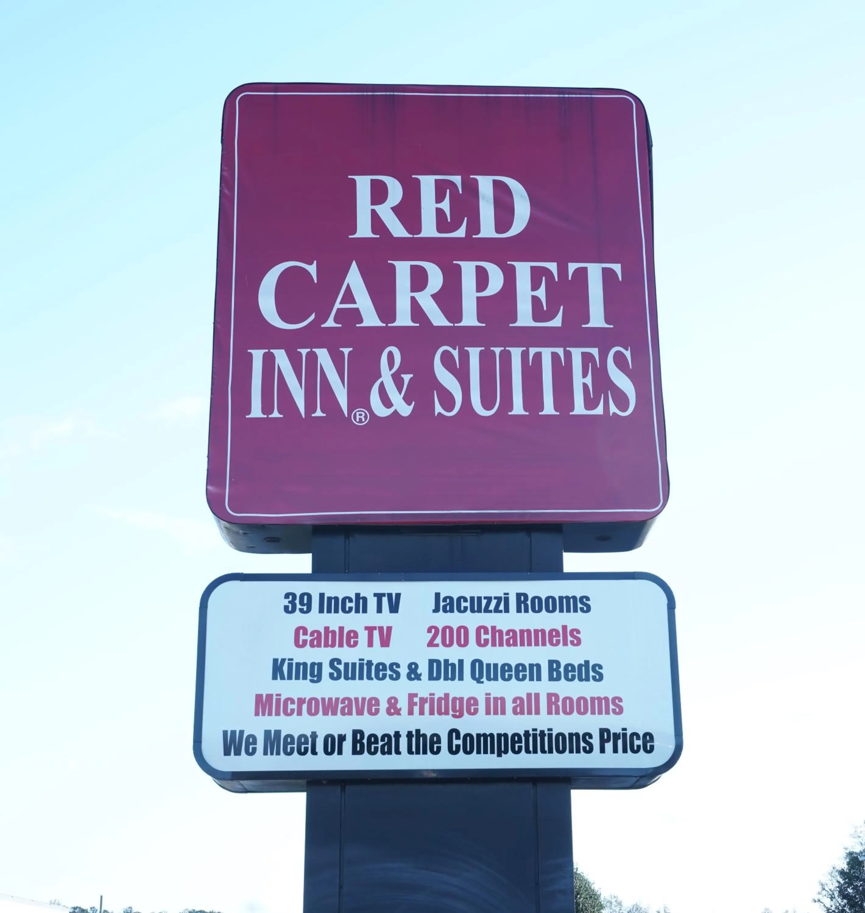 Property logo or sign in Red Carpet Inn & Suites