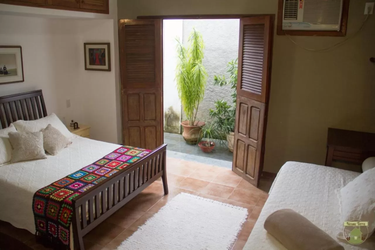 Bed in Pousada Nossa Terra