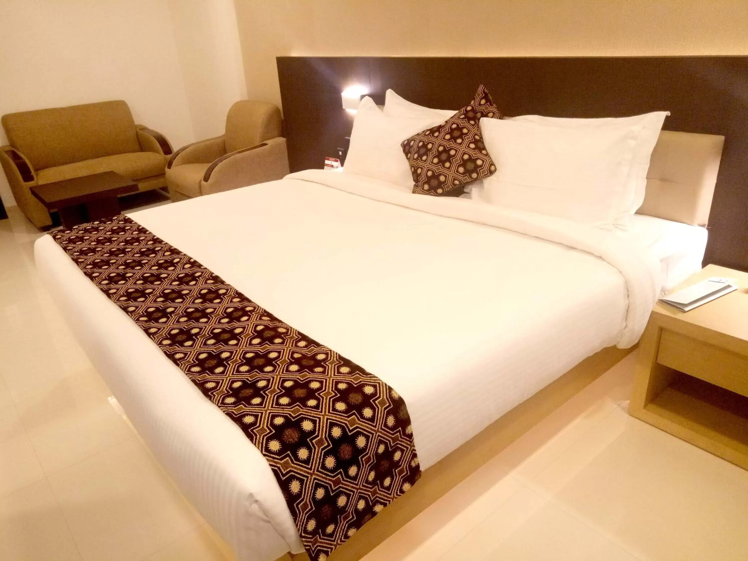 Bed in HOTEL SAVITHRI