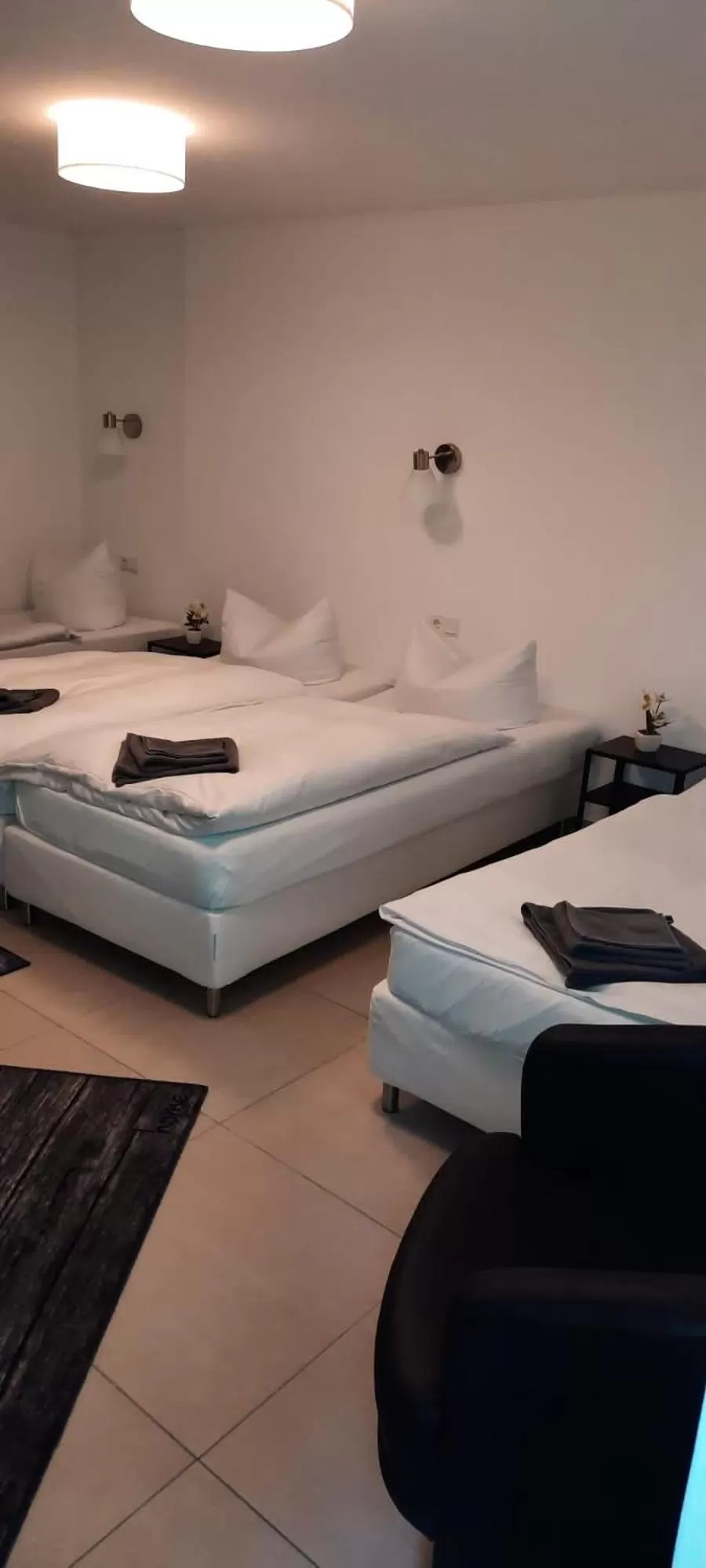 Bed in Nürnberger Trichter Family-Business Hotel Garni