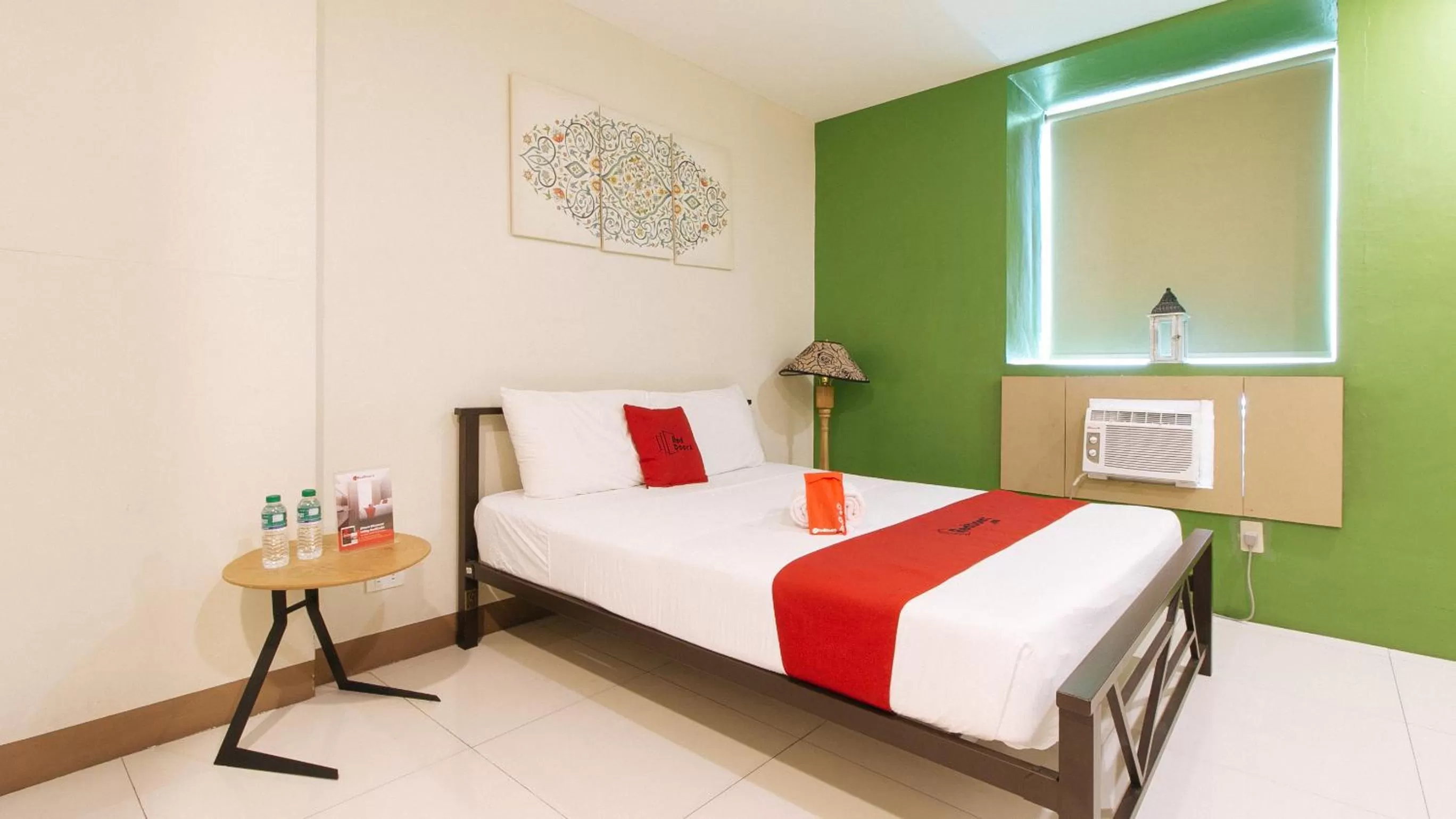 Bed in RedDoorz Plus at Kamuning Quezon City