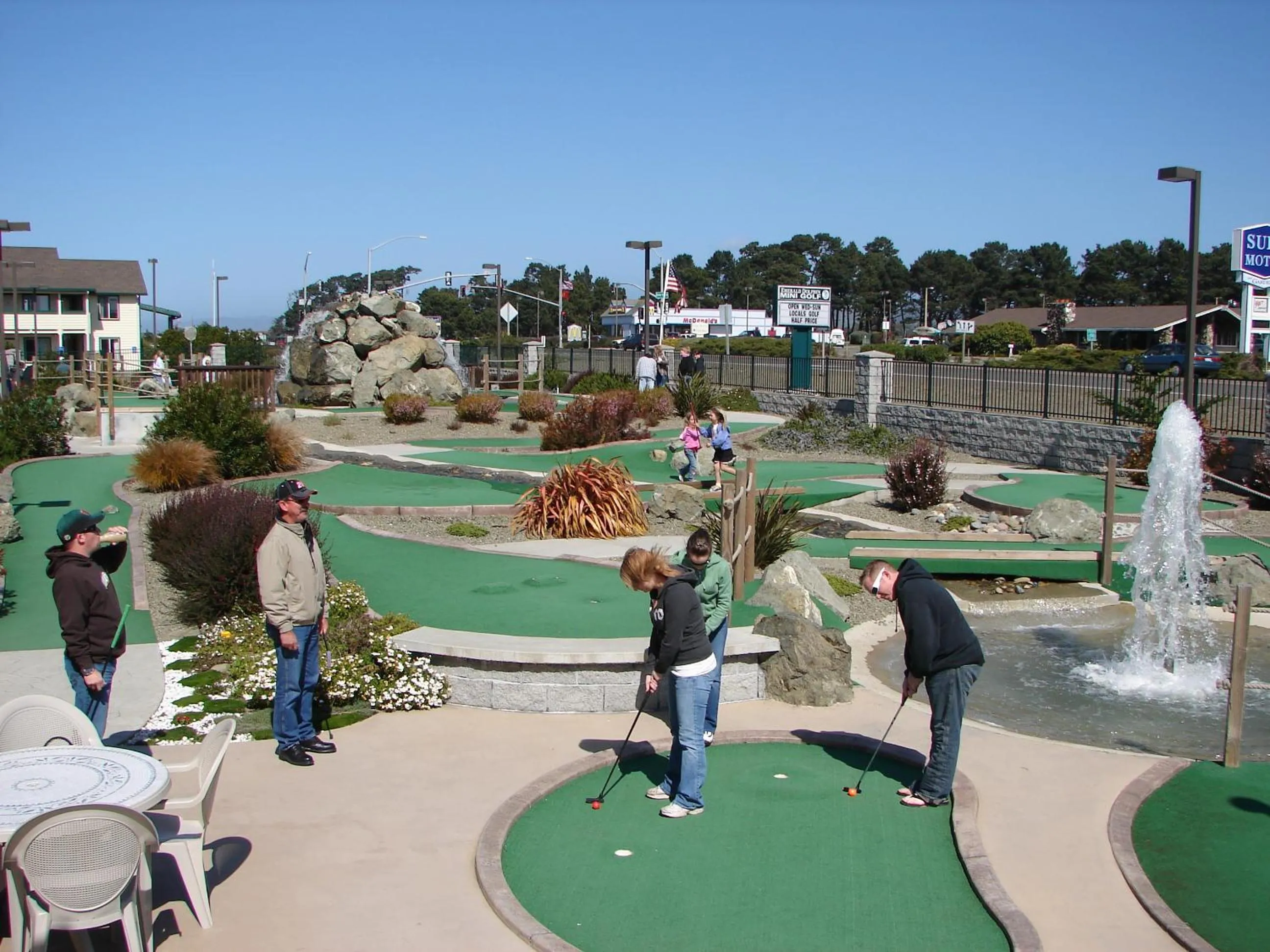 People in Emerald Dolphin Inn & Mini Golf