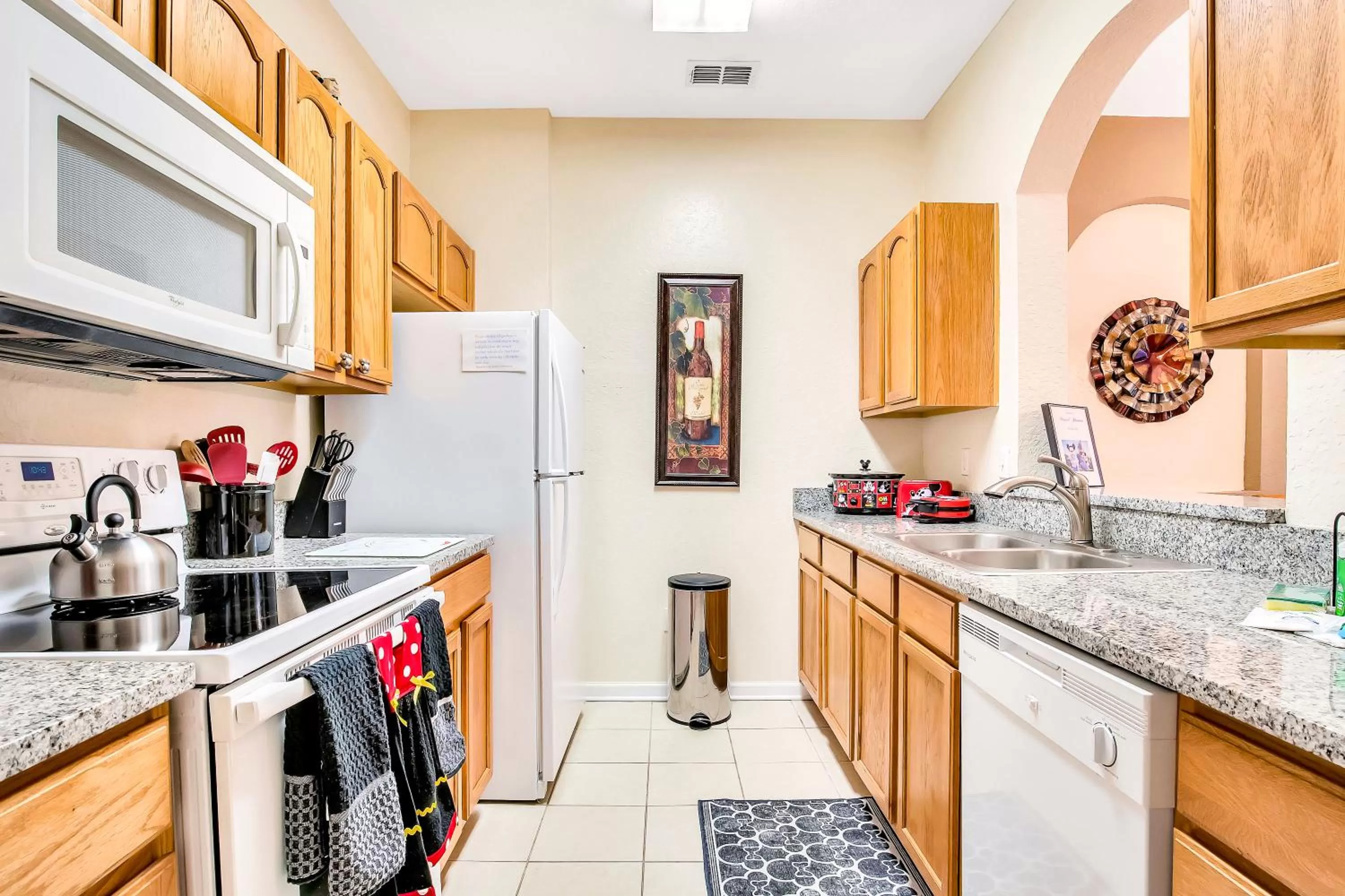 kitchen in Magical Adventure Condo w Waterpark near Disney No Resort Fees