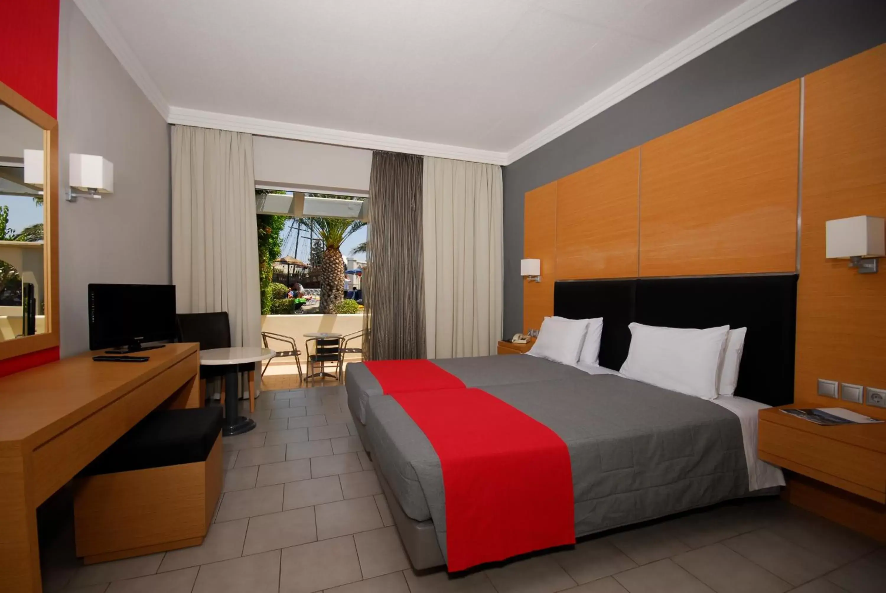 Double or Twin Room with Garden View in Kipriotis Village Resort Double or Twin Room with Garden View in Kipriotis Village Resort