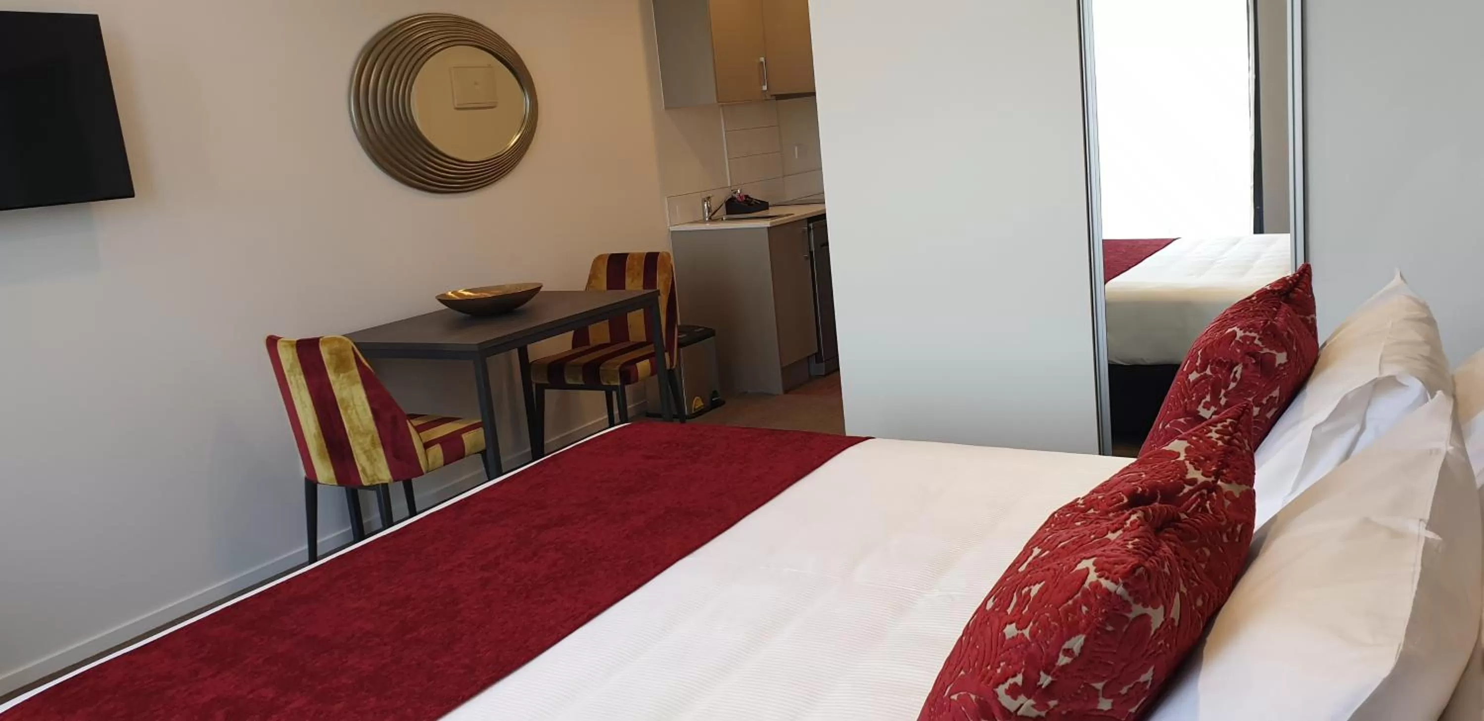 Bedroom, Bed in Ramada Suites by Wyndham Auckland Manukau Pacfic Centre