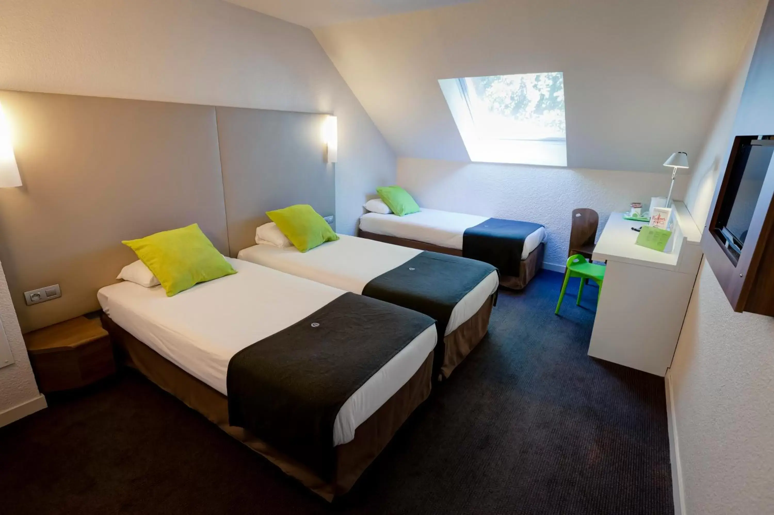 Quadruple Room (3 Adults + 1 Child) in Campanile Genève - Ferney-Voltaire Quadruple Room (3 Adults + 1 Child) in Campanile Genève - Ferney-Voltaire