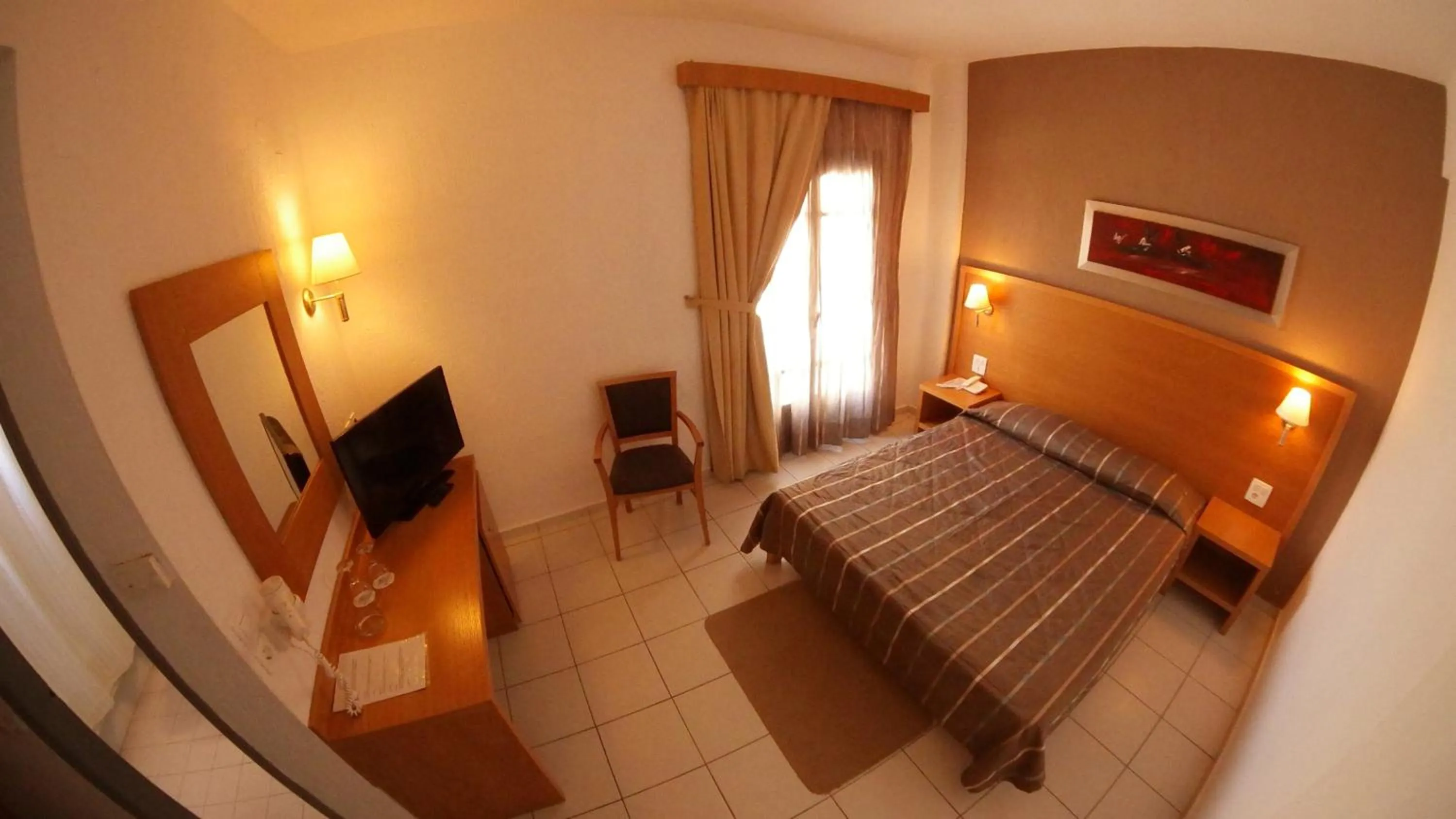 Property building, Bed in Europa Beach Hotel